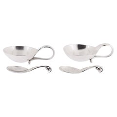 Coppia di saliere e cucchiai ornamentali in argento di Georg Jensen n. 110