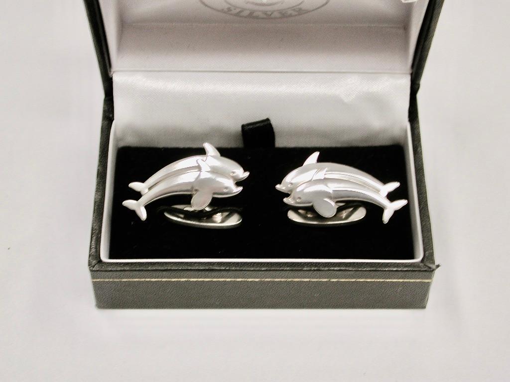Pair Of Georg Jensen Silver Double Dolphin Cufflinks,Circa 1960,Copenhagen
This delightful sterling silver pair of cufflinks have a swivel oval bar at the back,
so they go through the cuff easily.

