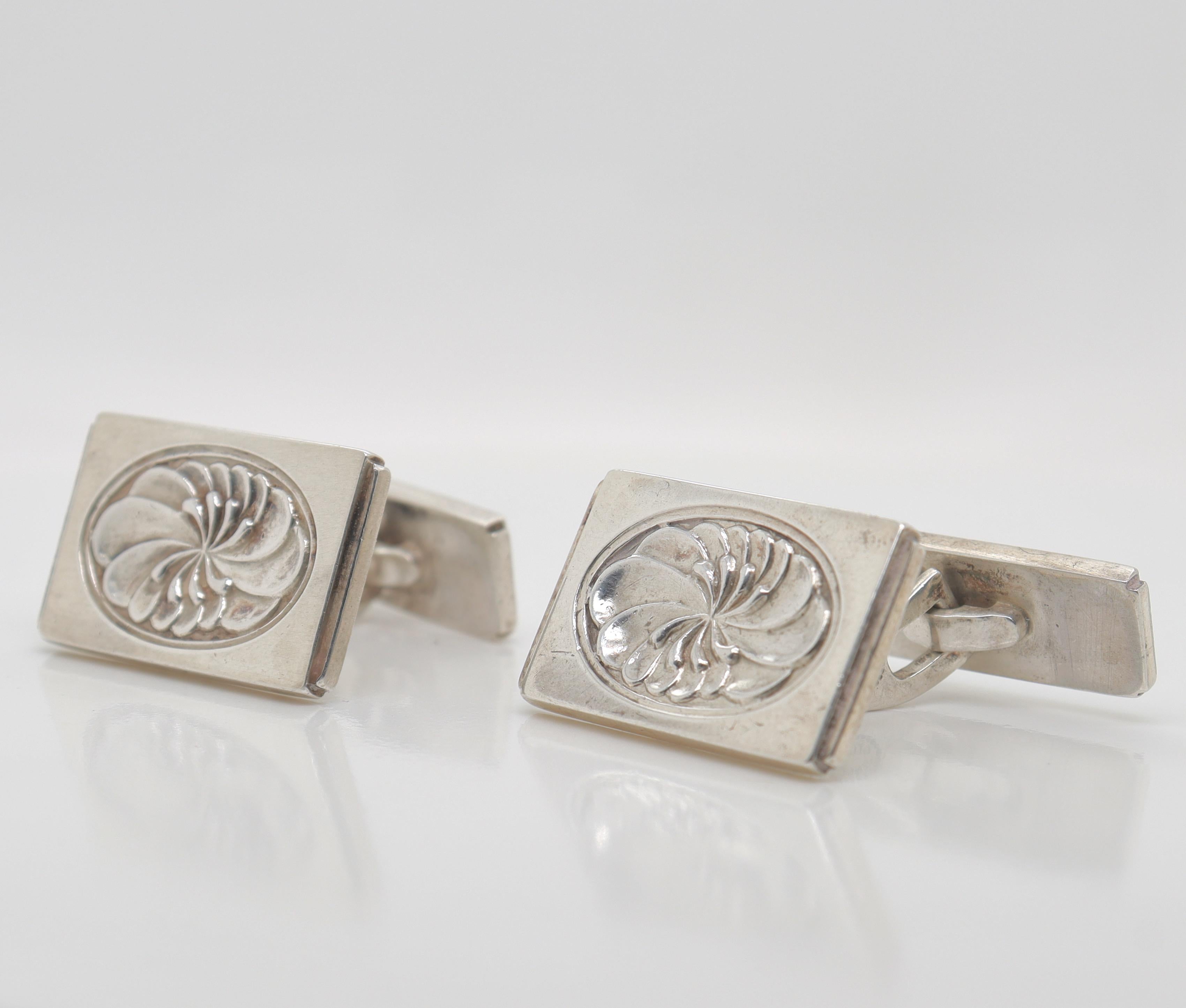 A fine pair of Georg Jensen sterling silver cufflinks.

Model no. 59A.

Designed by Henry Pilstrup for Georg Jensen.

Simply a wonderful pair of cufflinks from one of Denmark's premier silversmiths!

Date:
20th Century, post-1945

Overall