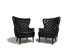 Pair of Georg Kofoed Sculptural Danish Wingback Chairs in Black Leather