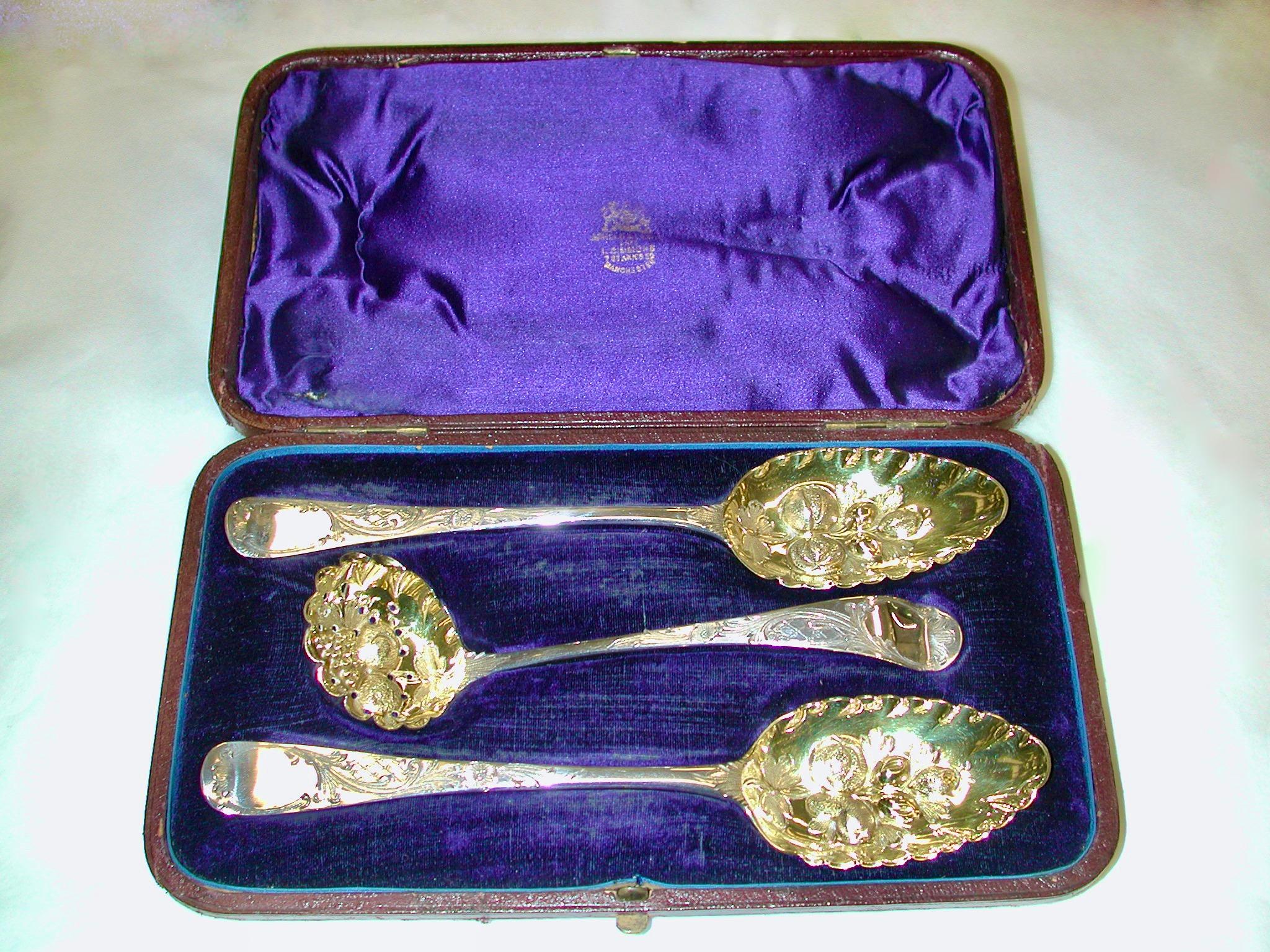 Pair of george 111 silver berry spoons with matching sugar sifter,1799-1805
Lovely fruit or dessert serving set, with wonderful fruit and leafwork chasing.