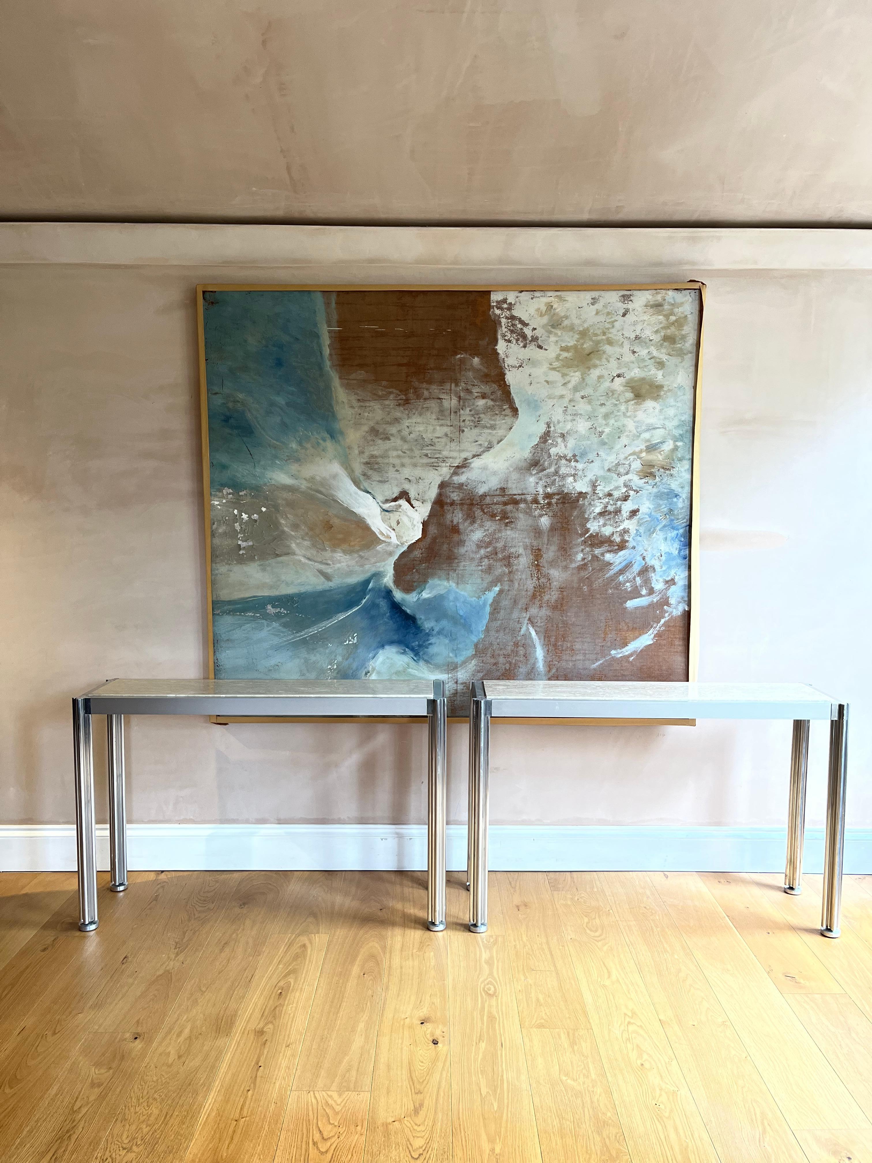 Pair of George Cianciamino brushed aluminium and travertine console tables 1
