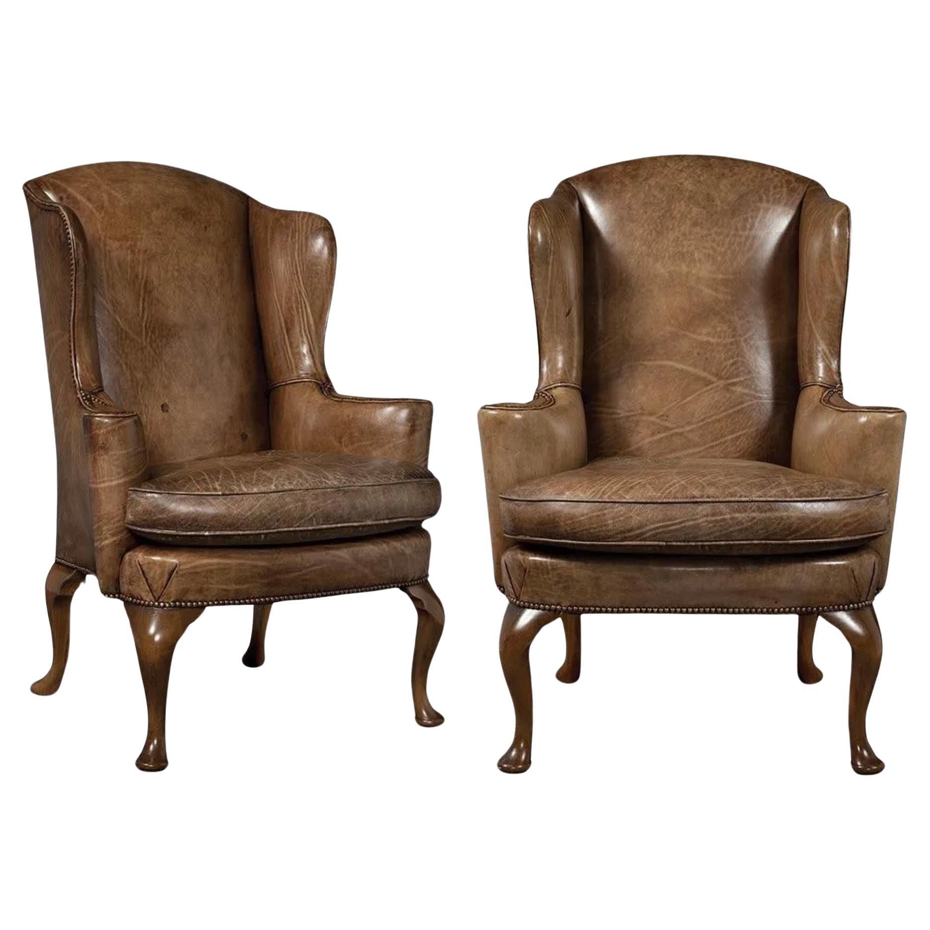 Pair of George I Style Leather Upholstered Wing Armchairs For Sale