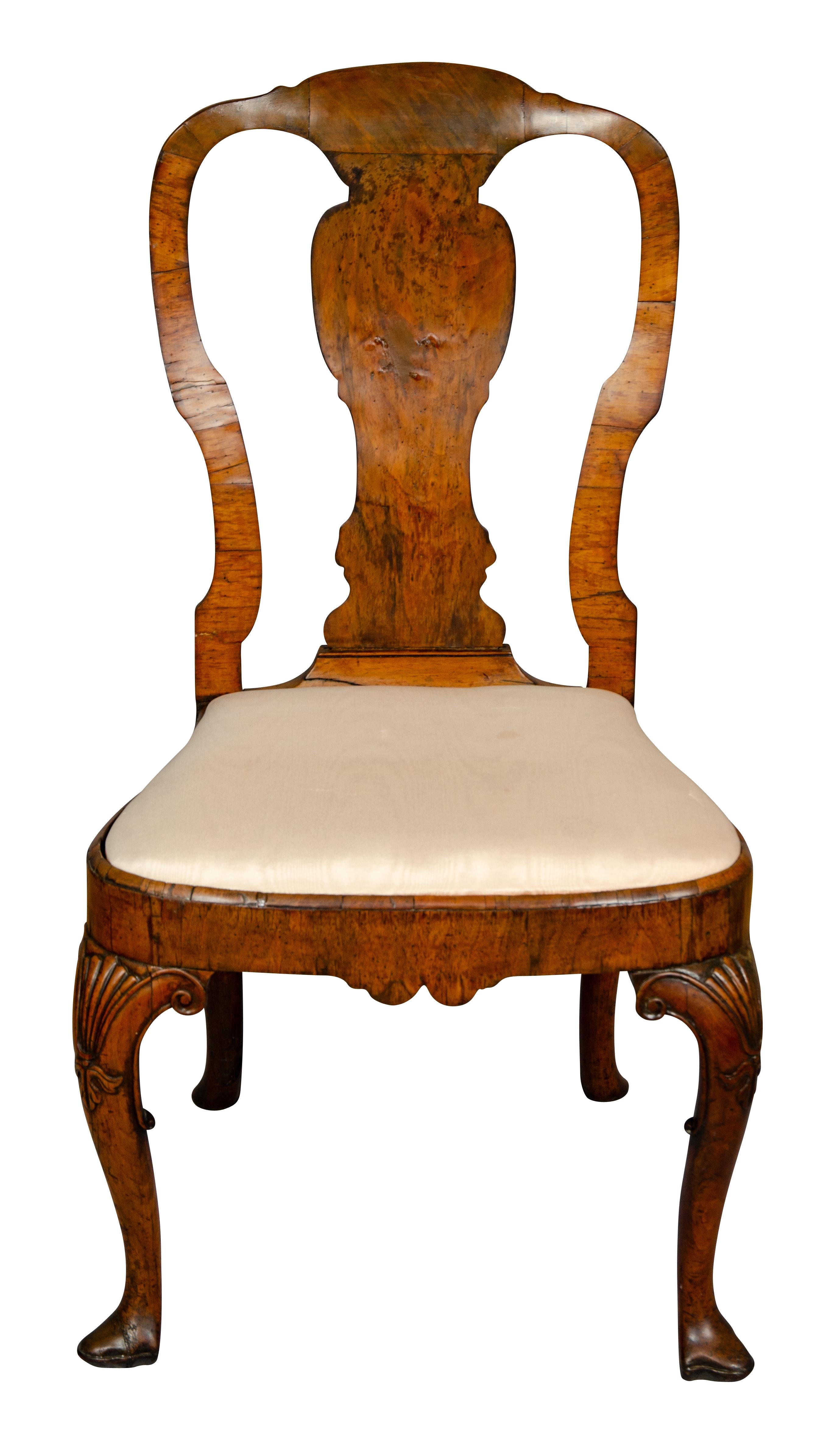 From a Bellevue Ave Newport family. Wonderful simple proportions. Arched back with central vasiform splat, balloon drop in seat, raised on cabriole legs with carved knees ending on pad feet.