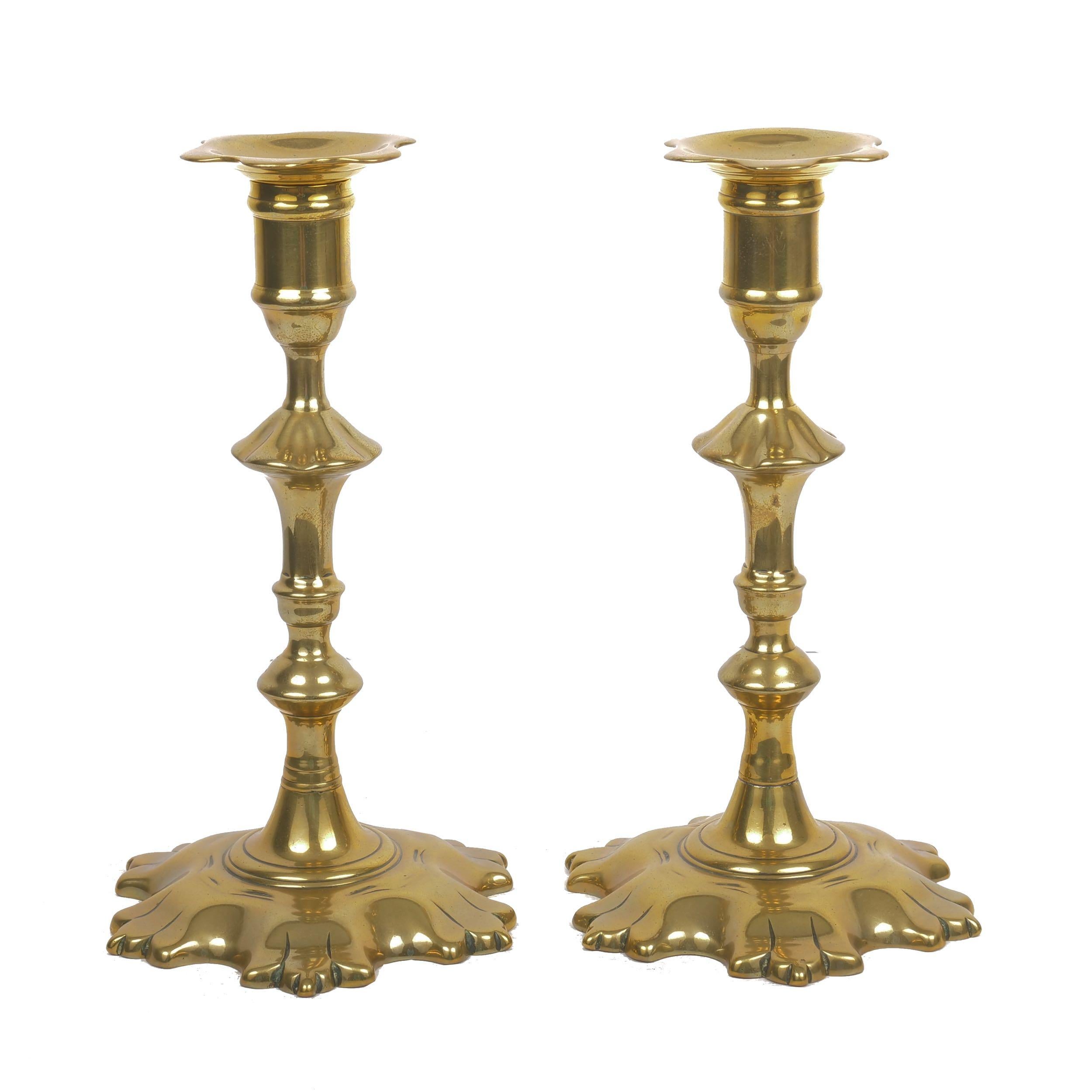 Pair of George II shell-base brass candlesticks
England, circa 1760
Item # C104016 

A fine pair of Georgian shell-base brass candlesticks with freely cast candle wells projecting over swollen-baluster stems. The undersides are beautifully