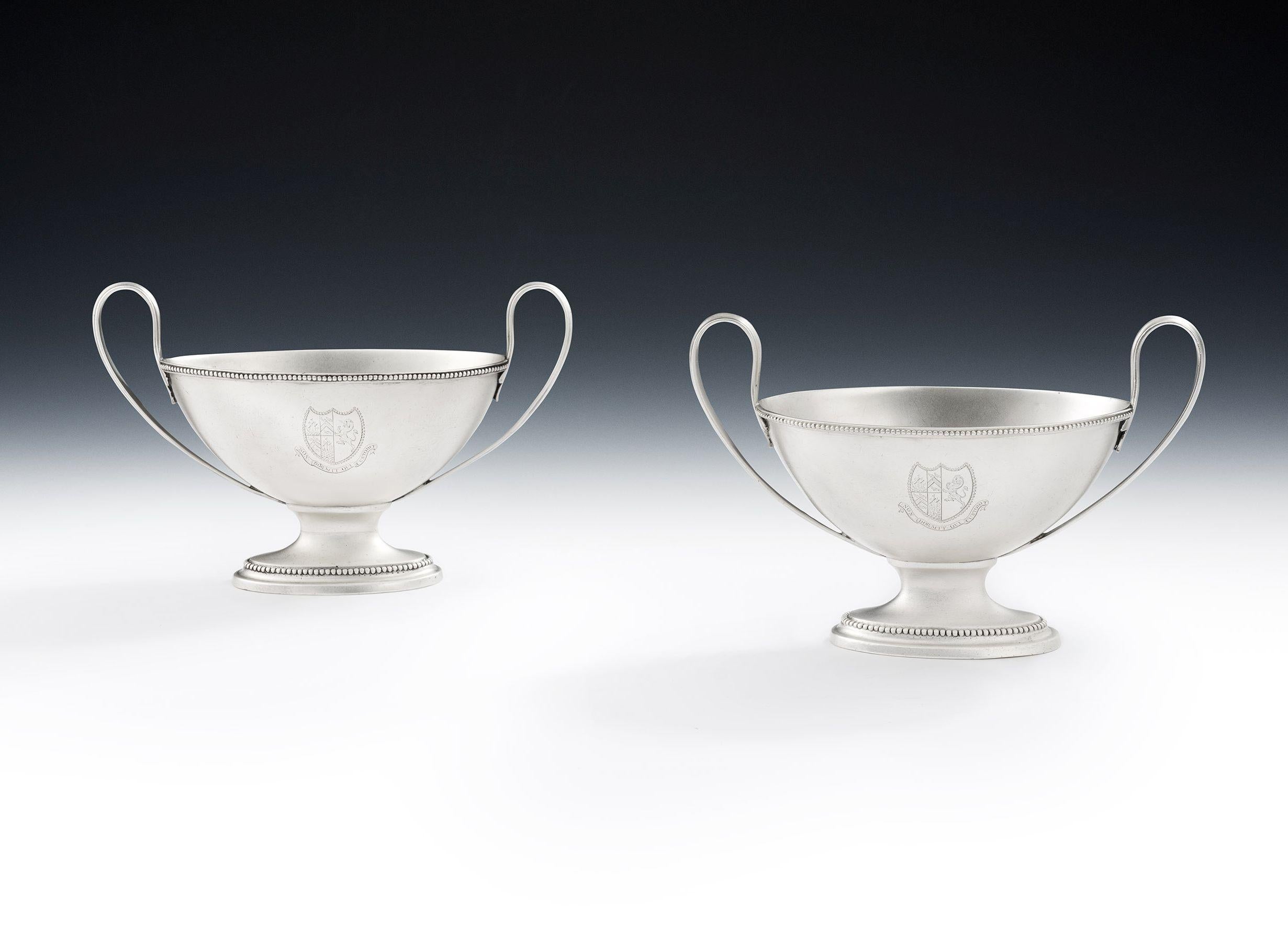 A rare pair of George III Butter Boats made in London in 1784 by Benjamin Mountigue.

These rare Butter Boats stand on a cast stepped spreading foot, which is decorated with beading.  The Boat shaped main bodies rise to an everted rim, also