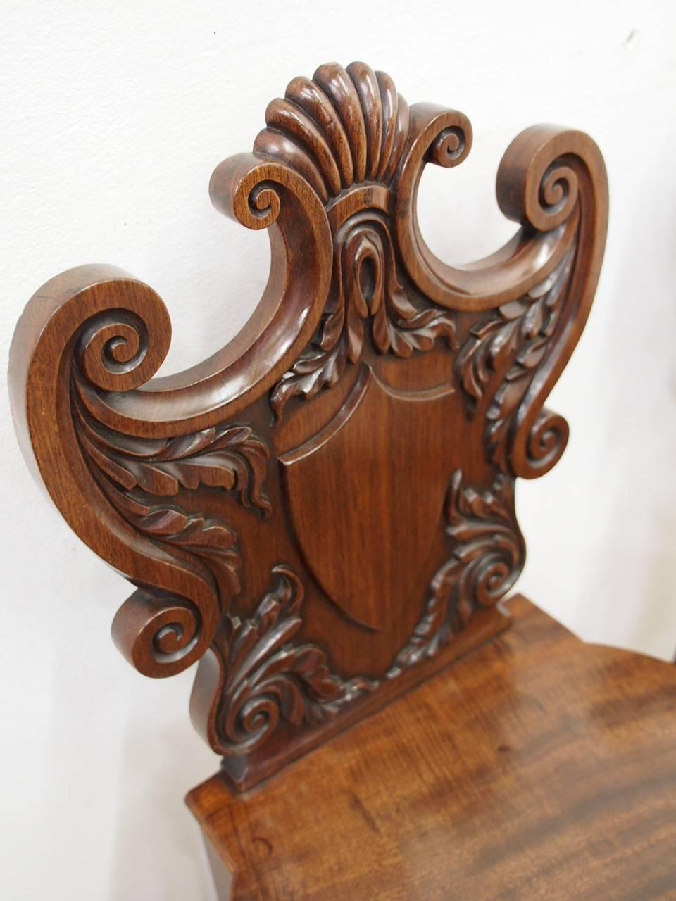 Pair of George III Carved Mahogany Hall Chairs, circa 1800 In Good Condition In Edinburgh, GB