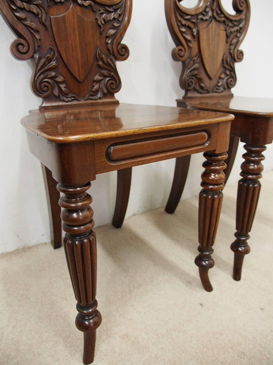 Pair of George III Carved Mahogany Hall Chairs, circa 1800 3