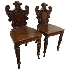 Antique Pair of George III Carved Mahogany Hall Chairs, circa 1800