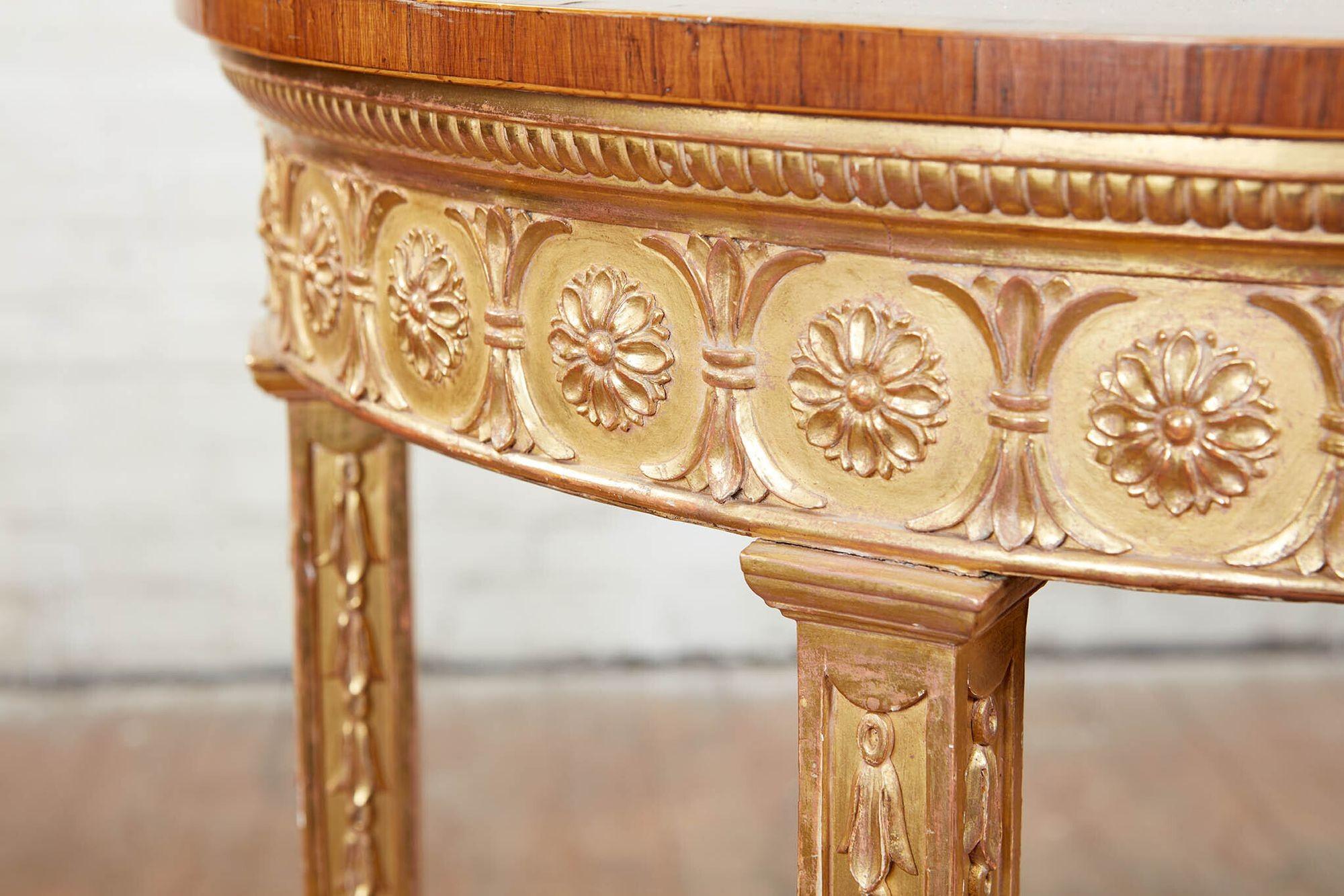 Late 18th Century Pair of George III Giltwood and Mahogany Console Tables For Sale