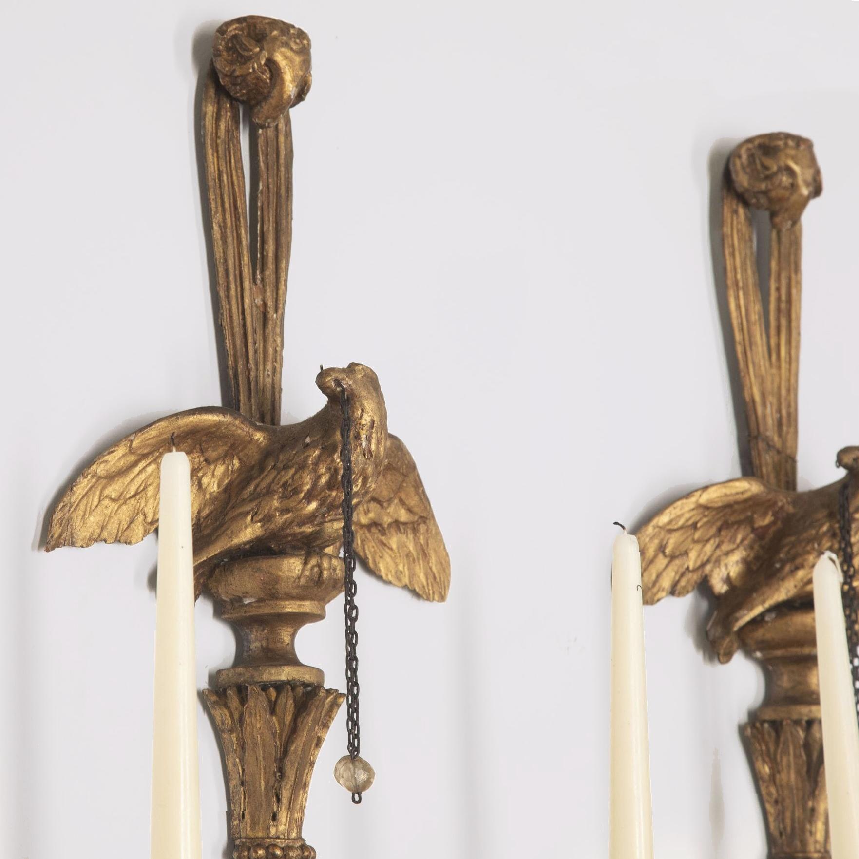 Metal Pair of George III Giltwood Candle Wall Lights with Carved Eagle and Ram's Head For Sale