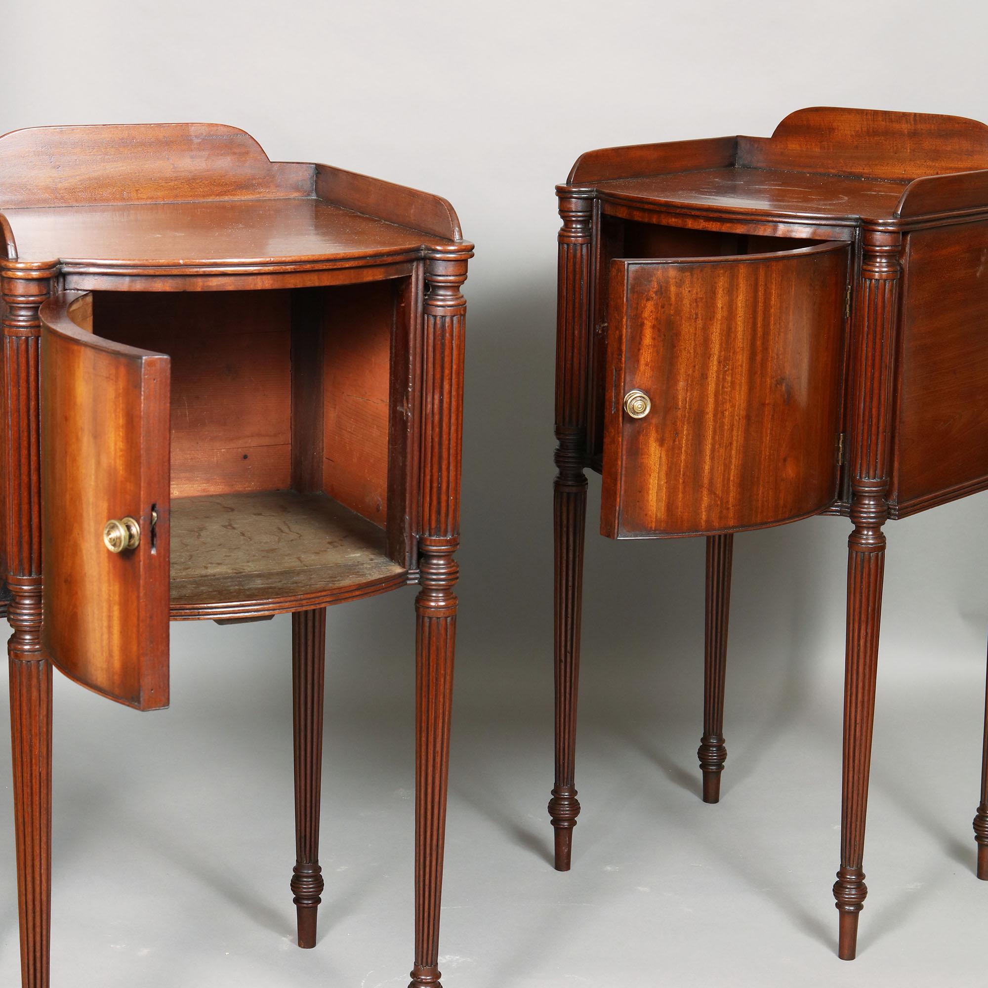 A very useful pair of late 18th century bedside cabinets
Crafted from the finest South American mahogany
With curved opposing doors and raised on tapering fluted legs in the manner of Gillows
The grain of the mahogany veneer is laid vertically