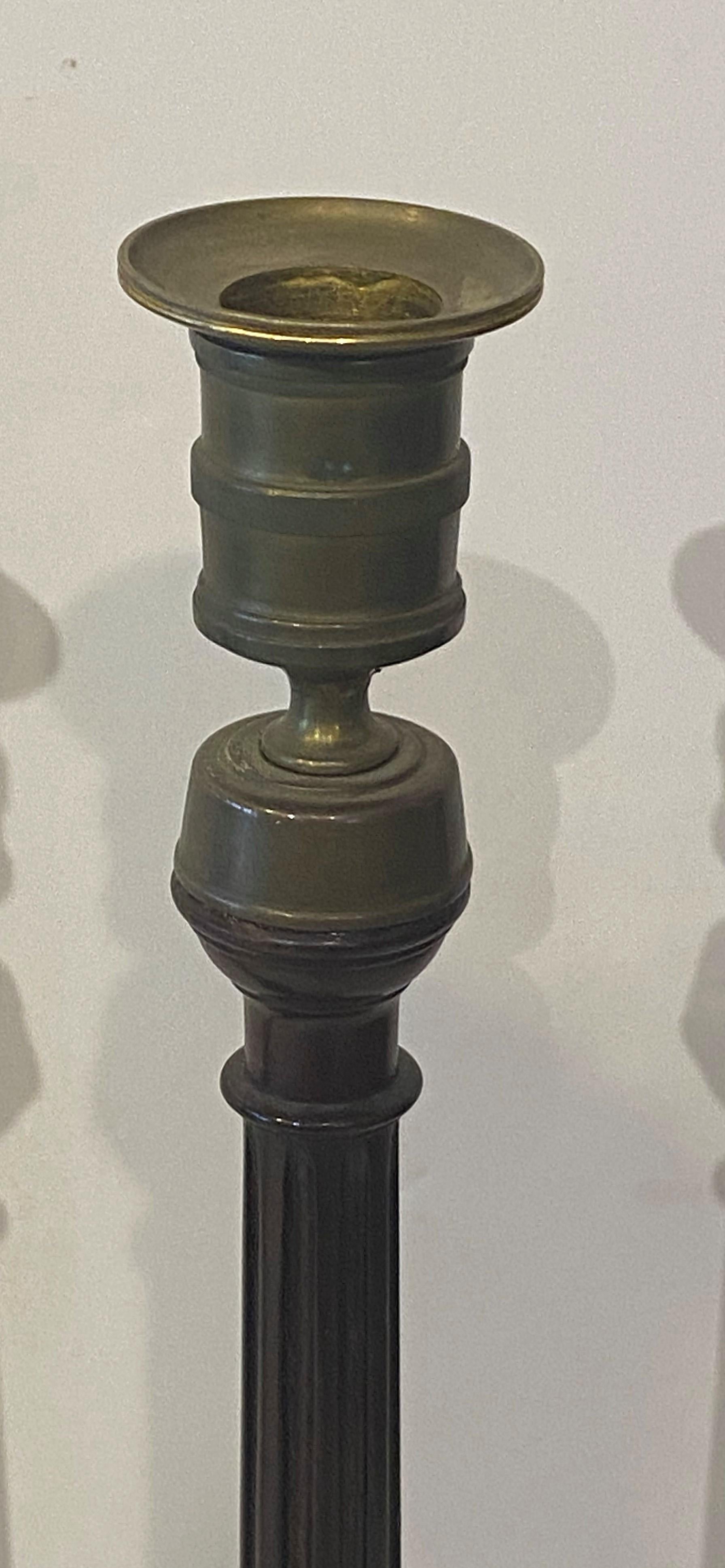 Fine pair of Georgian mahogany candlesticks with twisted columns and brass nozzles and drip pan--note these are not Victorian copies but period Candlesticks, late 18th C. 16.5