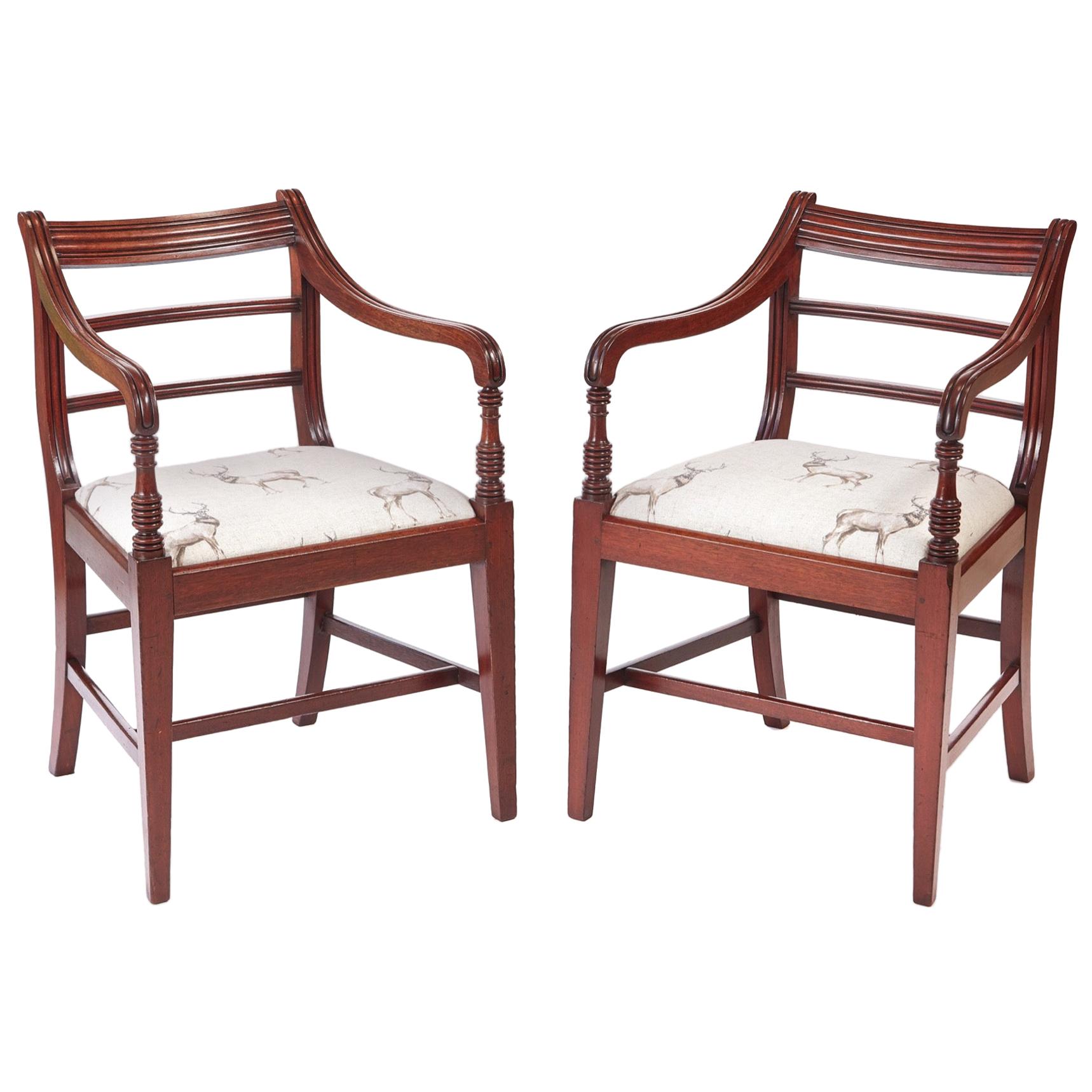 Pair of George III Mahogany Elbow / Desk Chairs