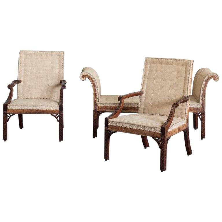 Pair of George III Mahogany Gainsborough Armchairs and Accompanying Stool For Sale