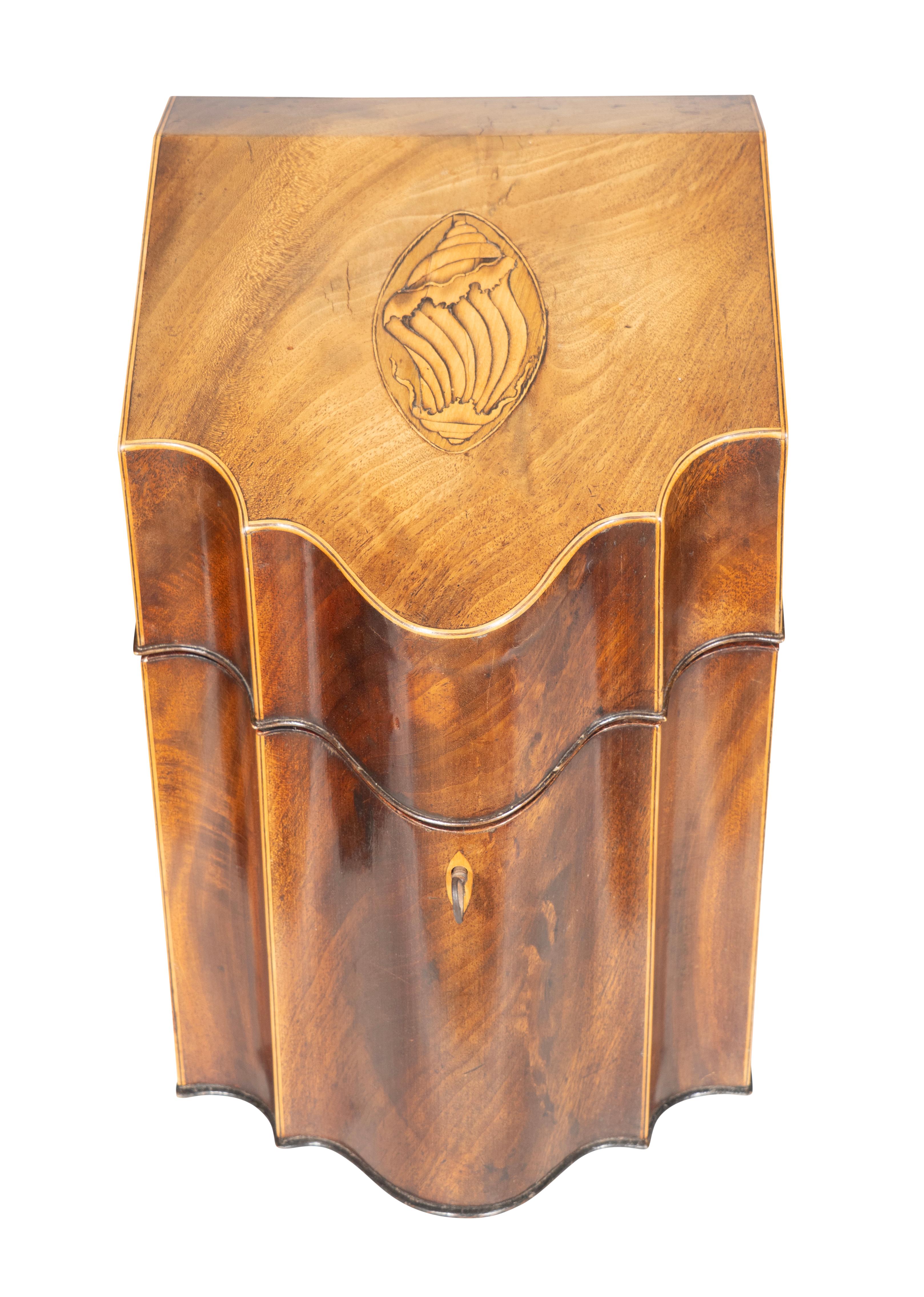 With hinged slanted lids with inlaid shells opening to fitted cutlery slots. Compass inlay on underside of lid. Conforming case with key holes.