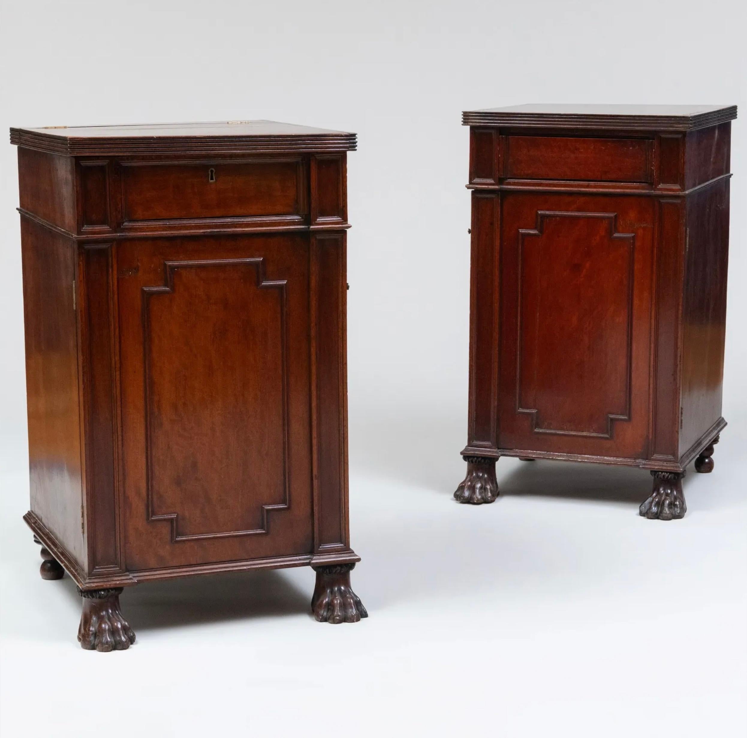 A wonderful pair of George III Mahogany Pedestal Cabinets - individually made and not believed to or have evidence of being a part of a larger sideboard. 

Both tops open and are accessible revealing the original interior. One pedestal opens to a