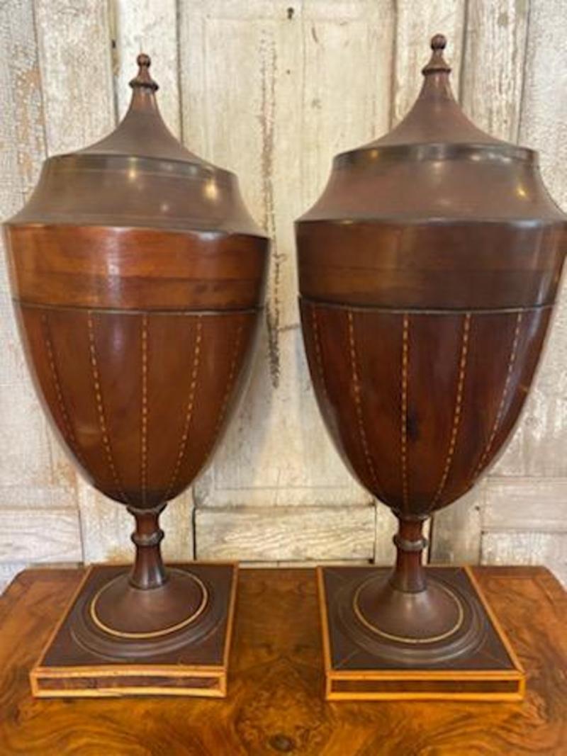 Beautiful pair of George III Mahogany urn form knife boxes.
Circa 1790
Measure: 24