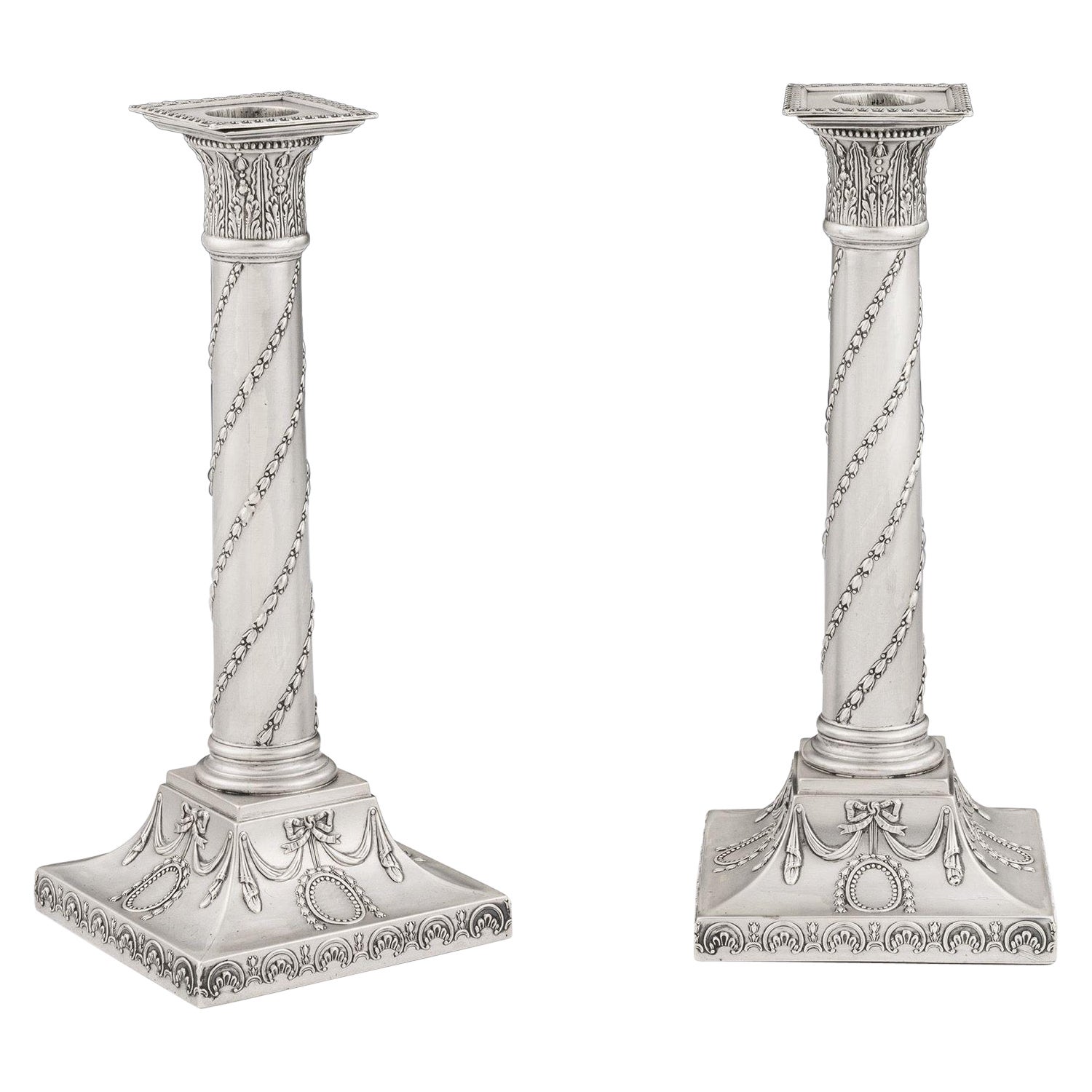 Pair of George III Neo Classical Candlesticks by John Winter & Company, 1775