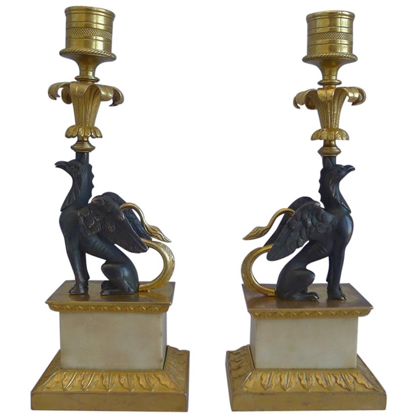 Pair of George III Ormolu and marble Chambers pattern Griffin Candlesticks