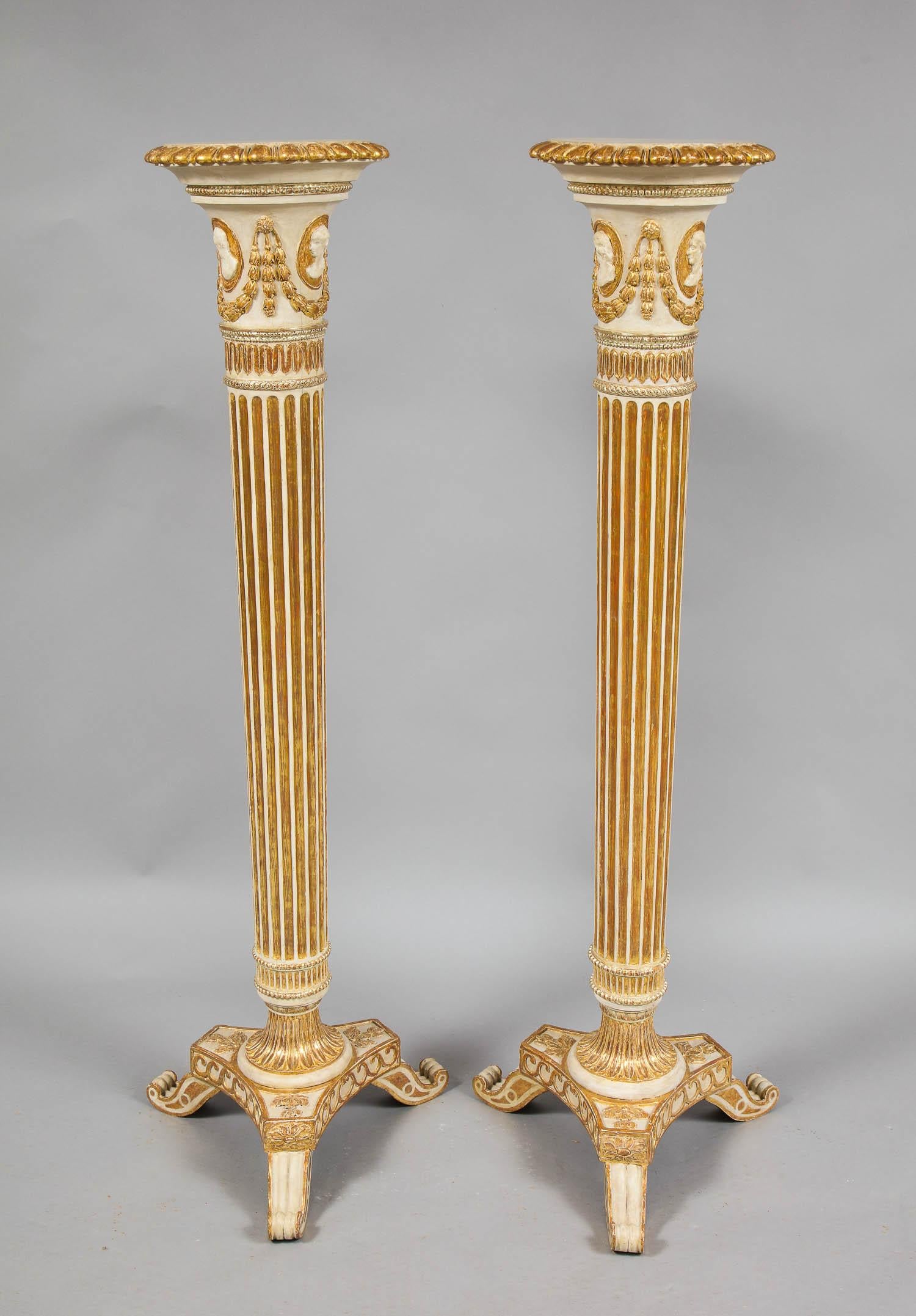 Pair of Adam pedestals possibly by Thomas Chippendale the Younger
 
Fine pair of Adam Neoclassical pedestals having gadrooned tops over classical medallion busts, the turned collars having carved long leaf caps, fluted shafts, foliage carved bases