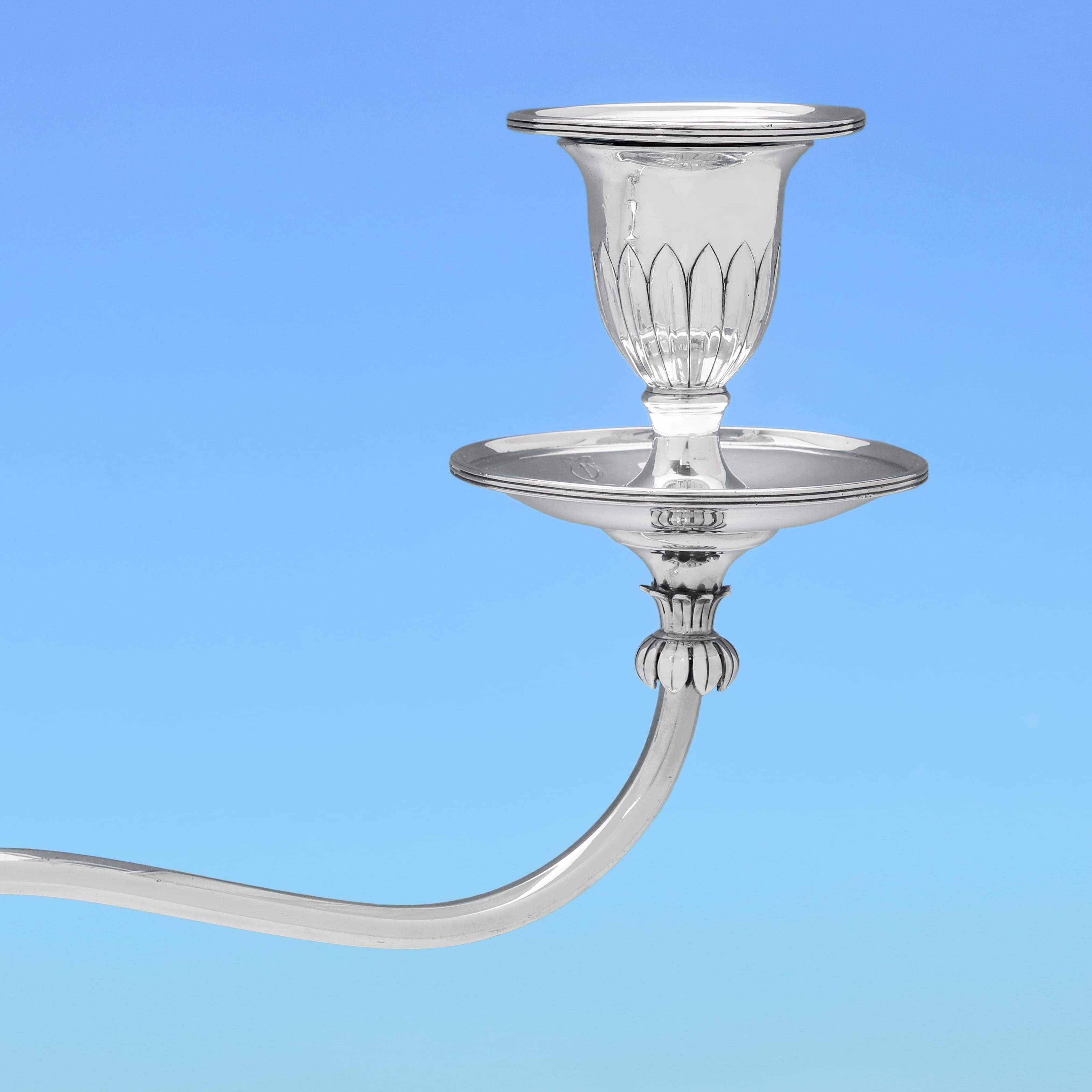 Late 18th Century Pair of George III period sterling silver candelabra made in 1799 For Sale