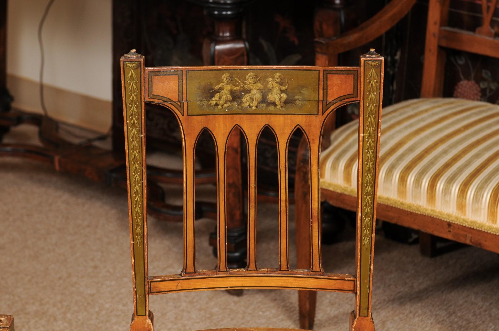 Cane Pair of George III Satinwood Side Chairs with Grisaille Painted Backsplats For Sale