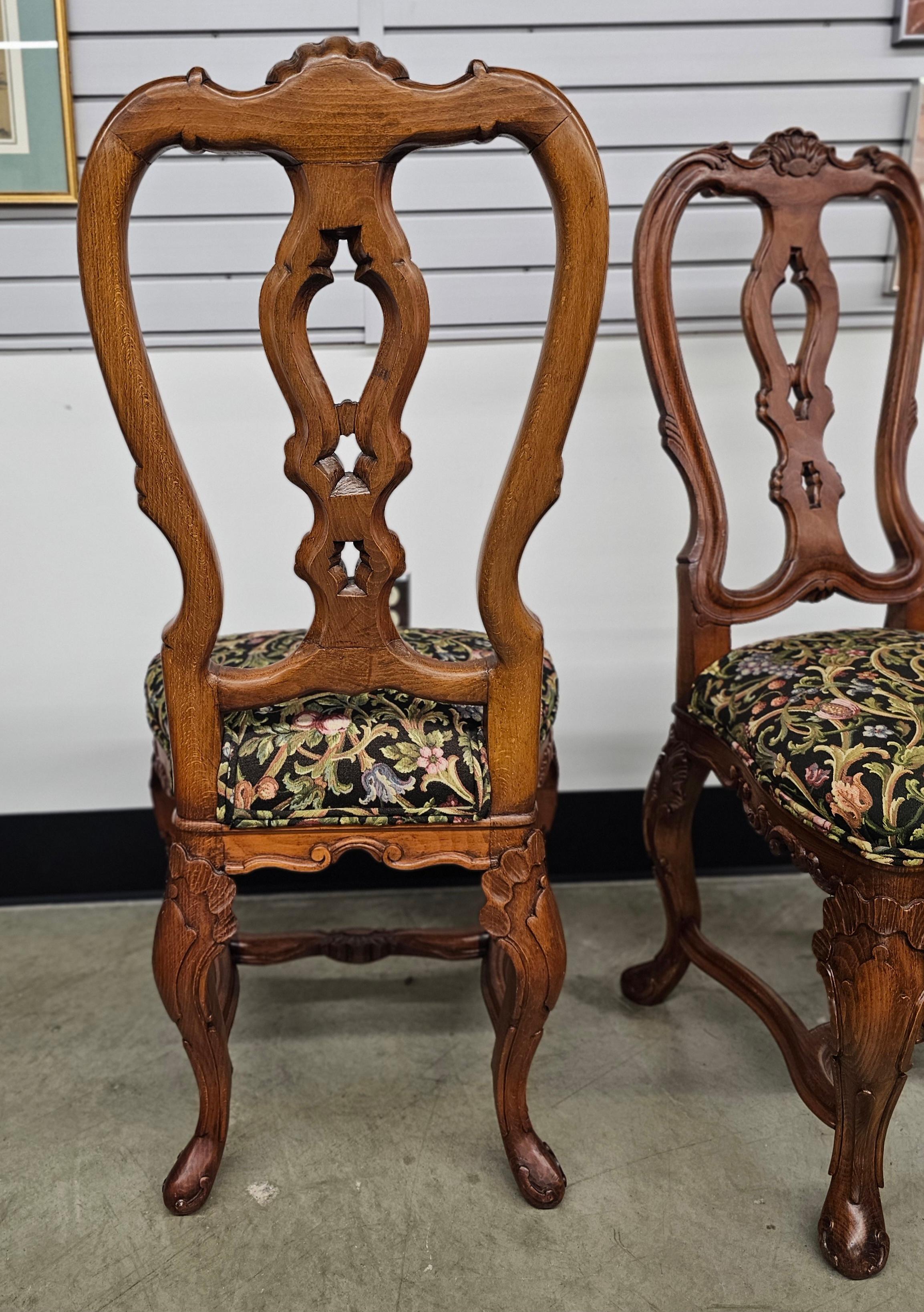 20th Century Pair of George III Style Carved Fruitwood and Floral Upholstered Side Chairs For Sale