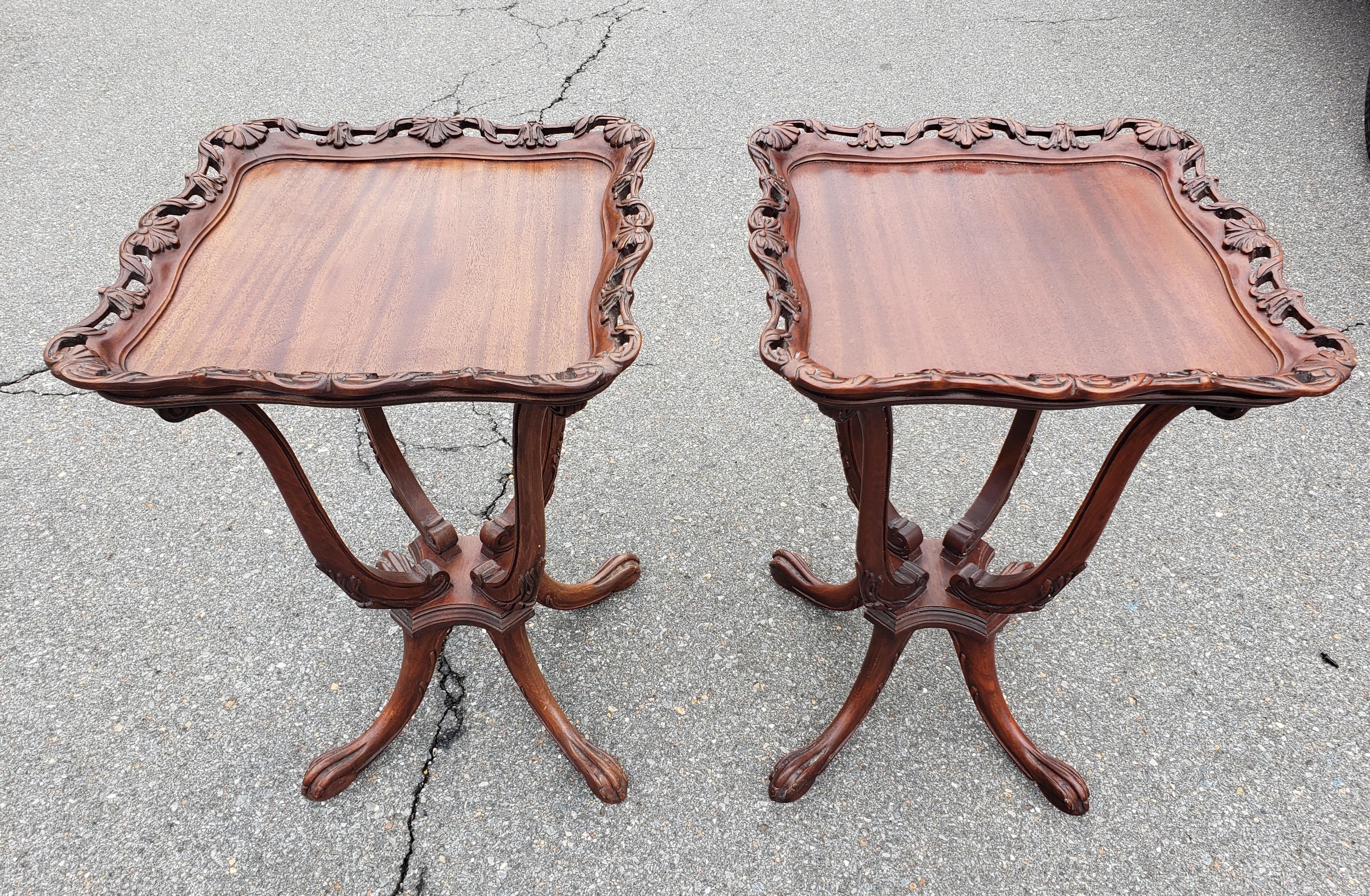 An original Pair of George III Style Carved Galleried Mahogany Quadpod  Side Tables with paw Feet. Table measure 20