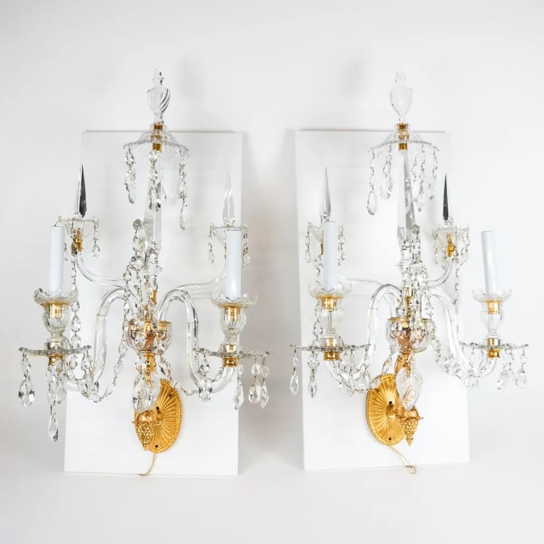 Pair of exquisite George III style wall sconces. Cut English crystal. Ormolu mounts.