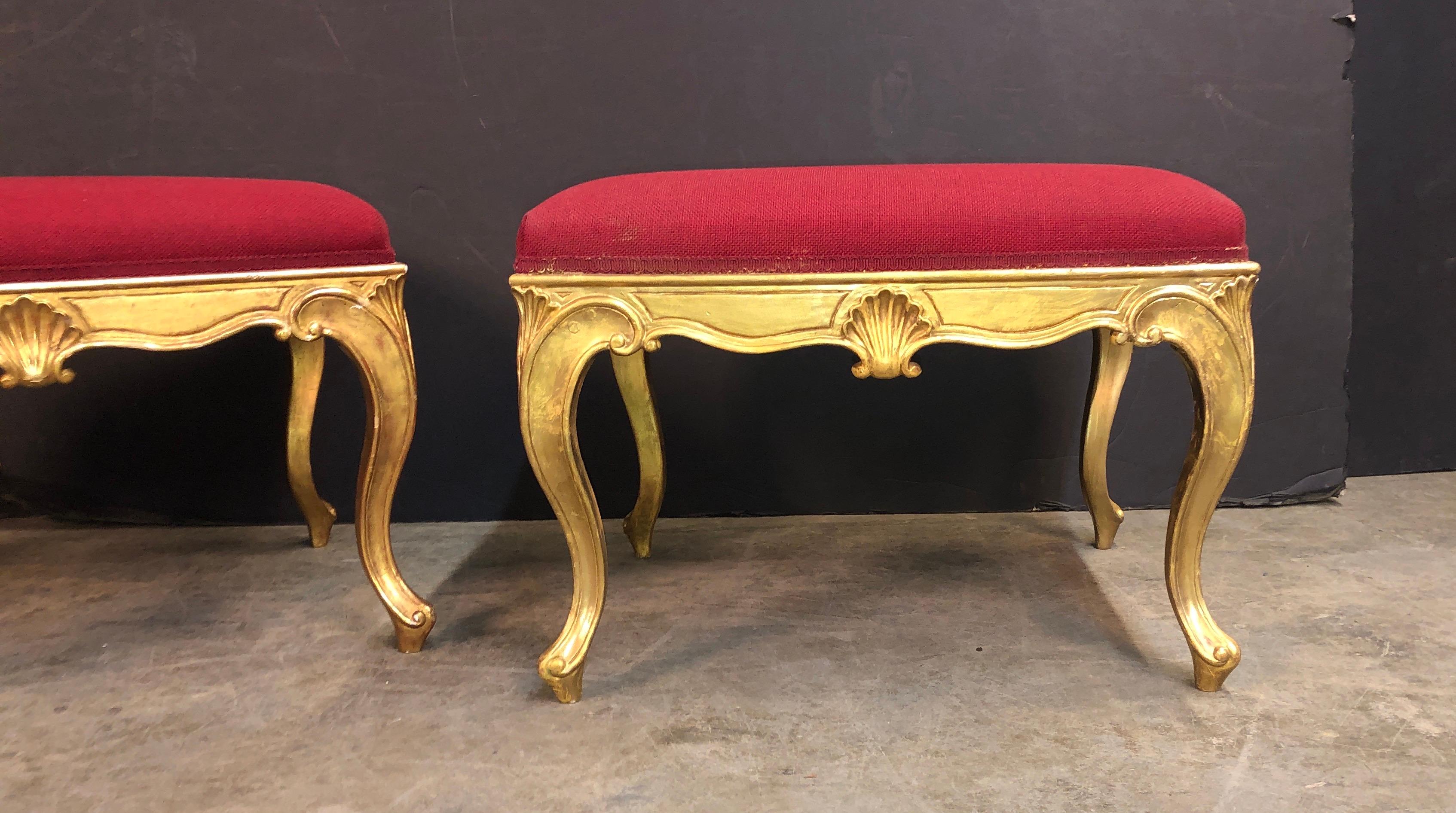 Pair of George III style - French Hepplewhite carved giltwood stools with carved shells and cabriole legs.