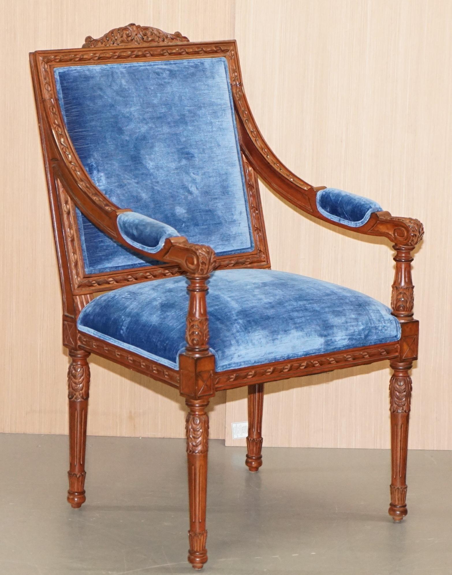 We are delighted to offer for sale this stunning pair George III style hand carved mahogany open armchairs with Royal blue velvet upholstery 

A very good looking and well made pair, the timber is ornately carved all over, there is exquisite