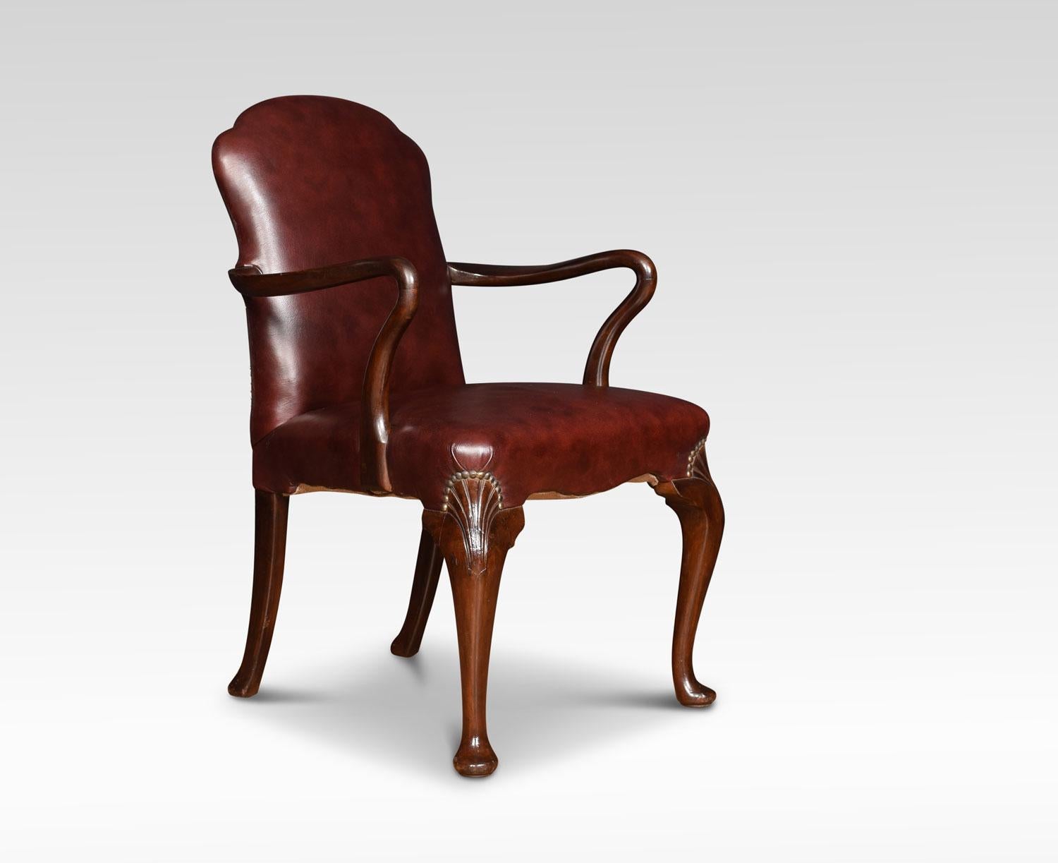 A pair of mahogany armchairs chairs, the Burgundy leather upholstered back and seat flanked by shepherds crook arms. All raised up on shell carved cabriole legs terminating in pad feet.
Dimensions:
Height 37 inches height to seat 19 inches
Width