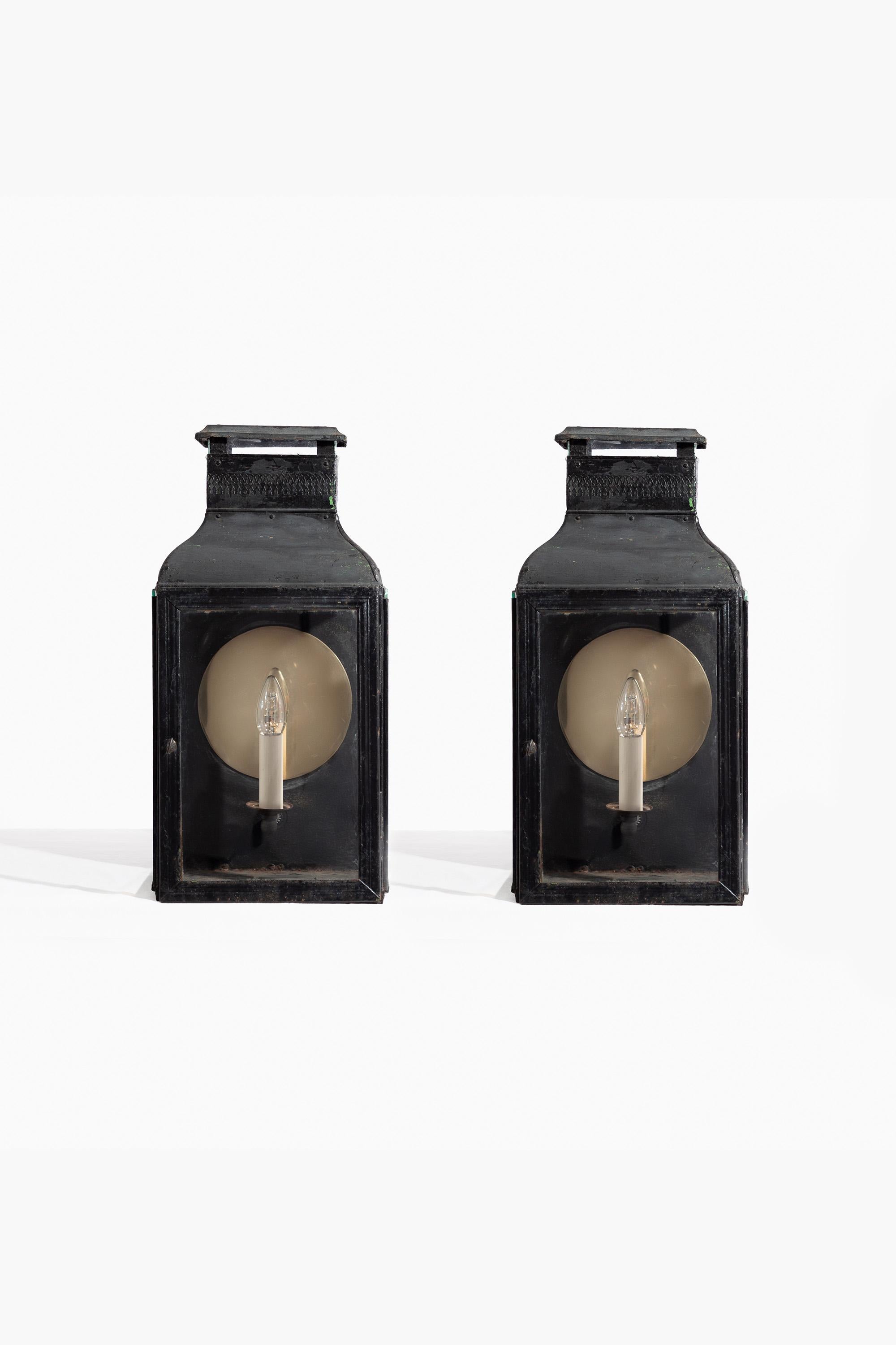 A pair of late George III Told Peinte Storm Lanterns, circa 1810.

A rare period survival, presented in original condition, with wear, marks, knocks and scratches as per age and use with old blue and green under paints visible.

A note on the