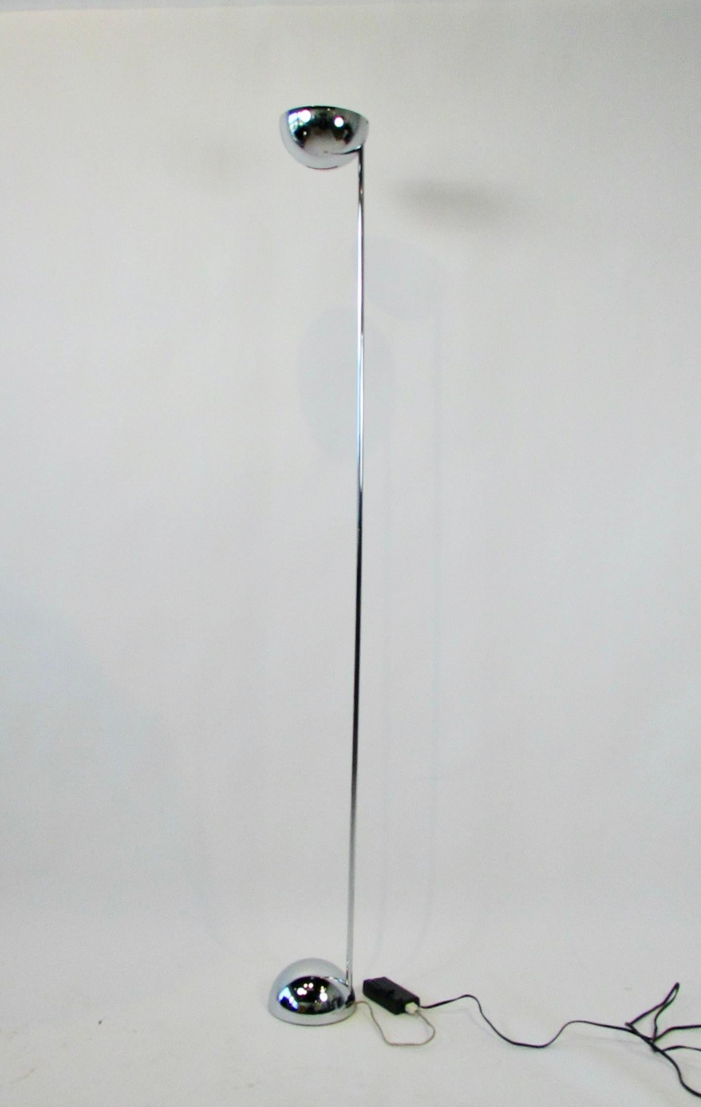 Pair of post modern torchiere floor lamps by George Kovacs in a polished chrome metal finish. lamp Exposed half-sphere used as both its base and shade joined by a long thin stem. The lamp retains its original wiring. George Kovacs is one the world’s