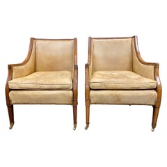 Pair of George Lll Style Leather Upholstered Mahogany Bergeres