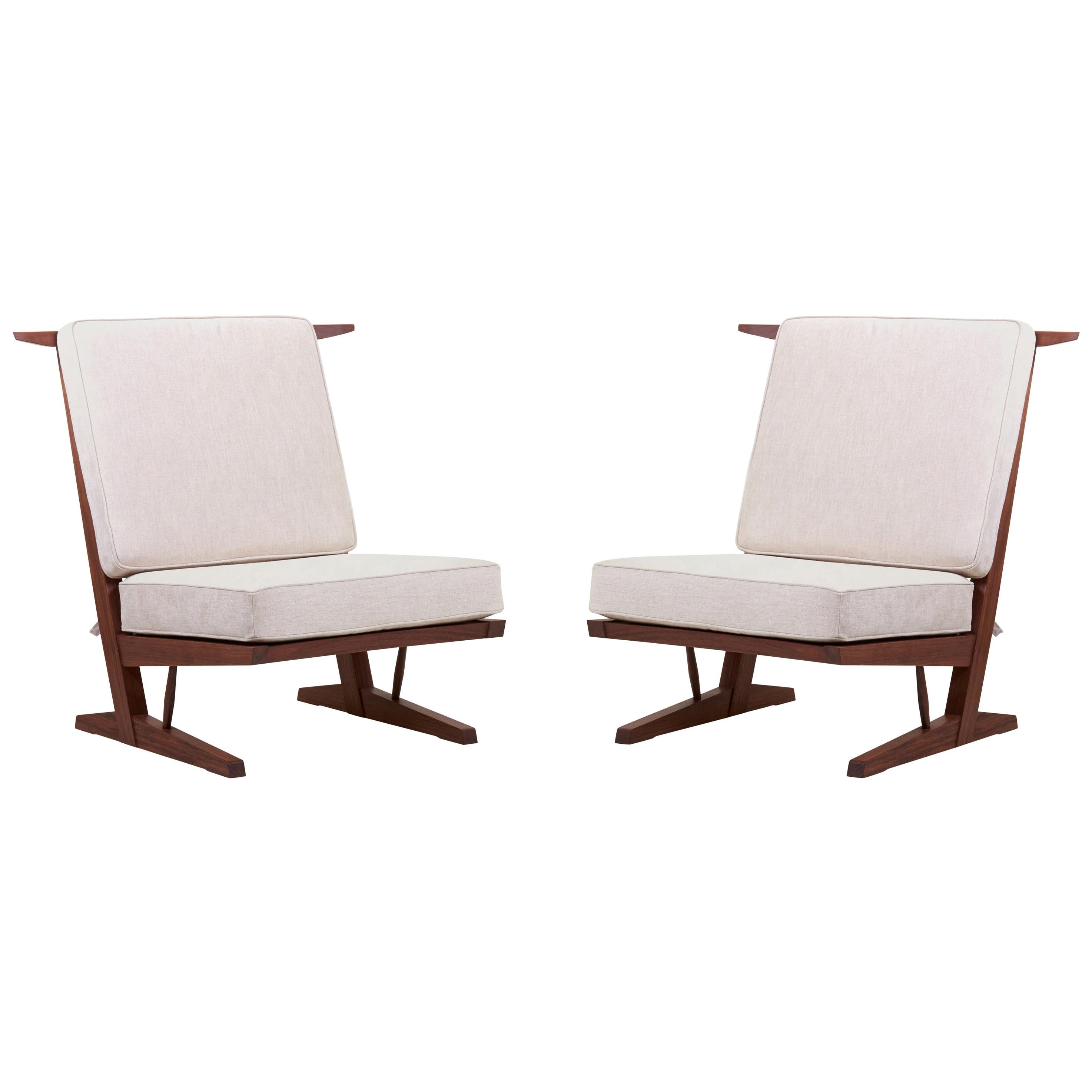 Pair of Conoid Lounge Chairs by Mira Nakashima after a George Nakashima design  For Sale