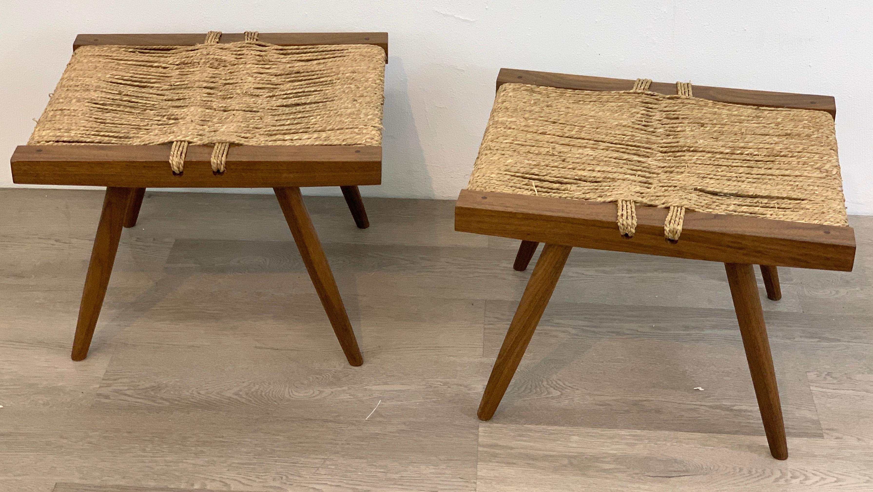 Pair of George Nakashima grass seat stools
George Nakashima (1905-1990)
Early pair of walnut grass seat stools, by George Nakashima, New Hope, PA. 1950s.