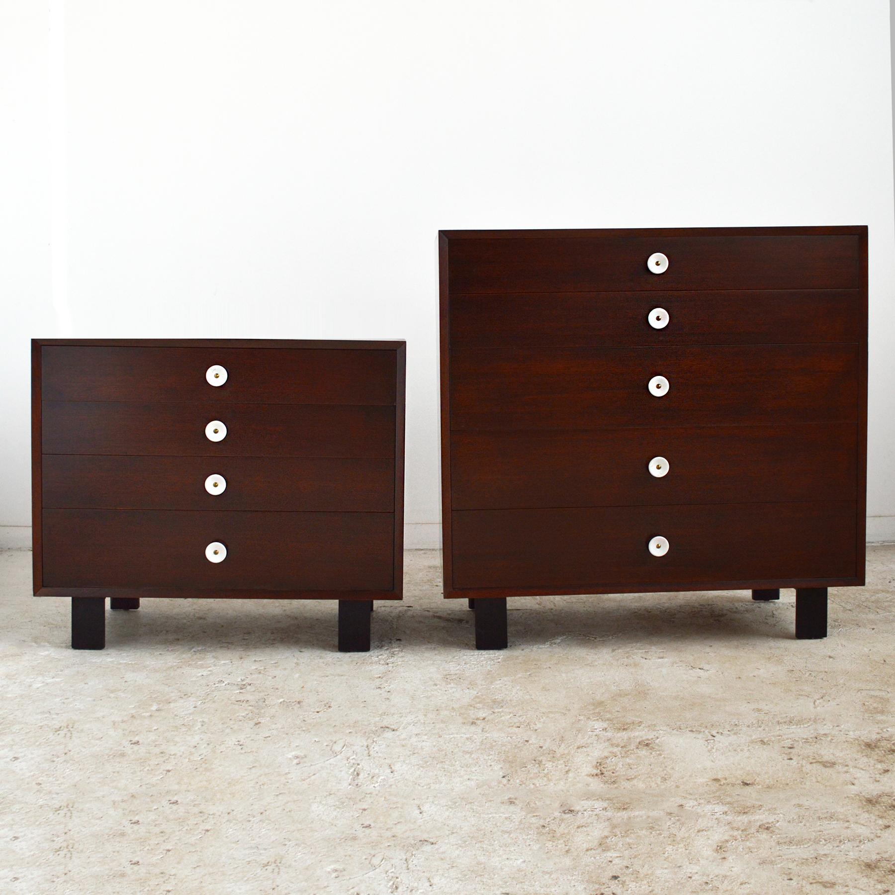 Here is a handsome pair of walnut dressers from the 