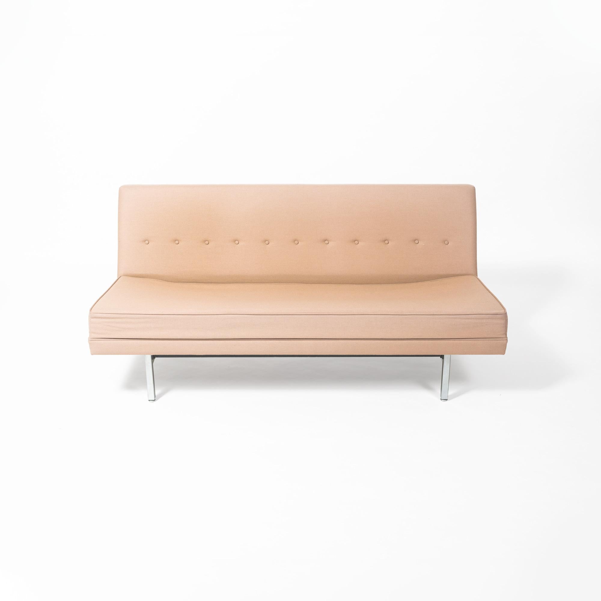 Pair of early George Nelson for Herman Miller sofa in original blush pink colored fabric upholstery and metal and wood frame. Early Herman Miller Label present underneath the sofa frame with chrome plated legs. This is an extremely rare George