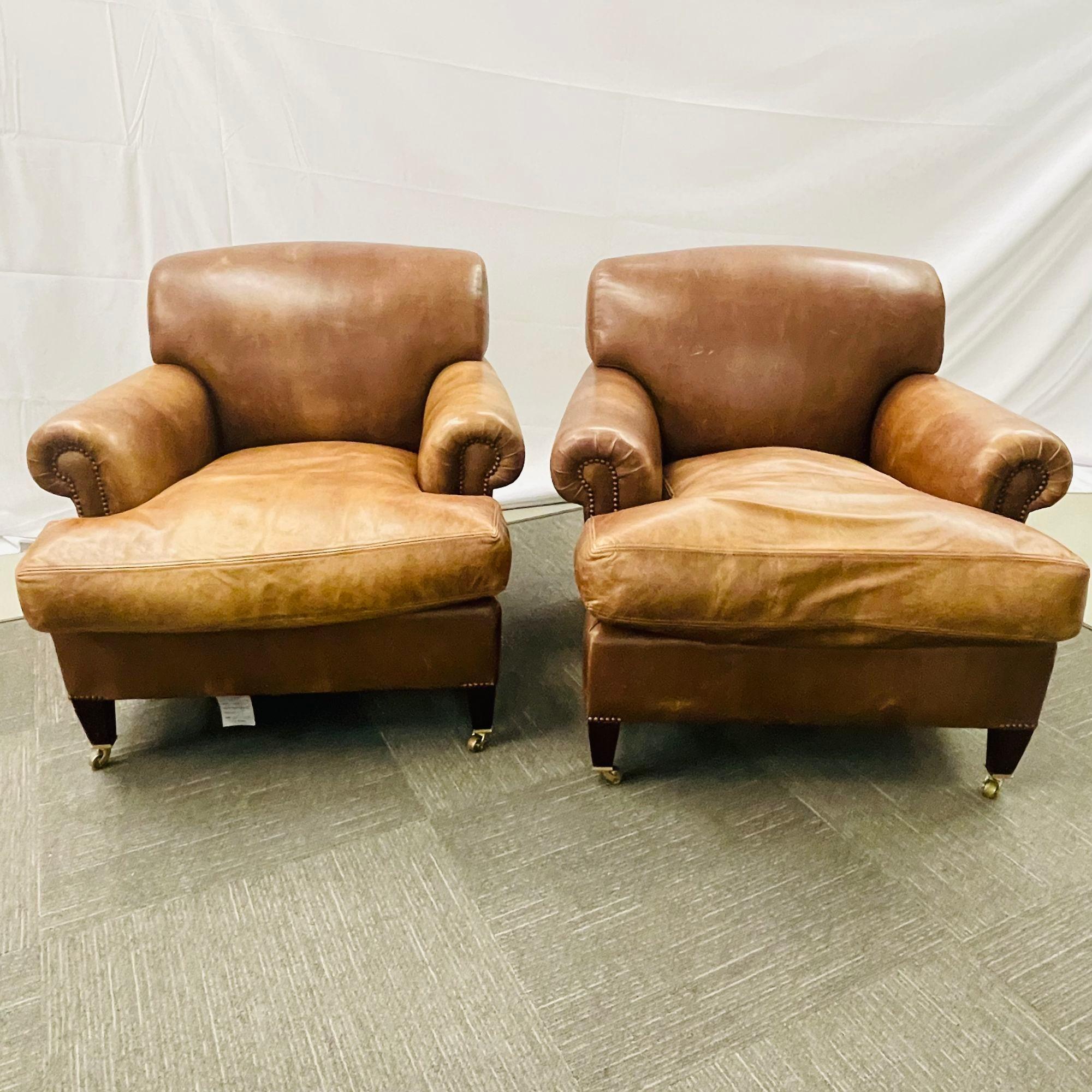 Howard George Smith Signature Scroll Arm Cigar Brown Leather Arm Chairs,
 
A stunning pair of custom manufactured large and comfortable oversized feather filled cushion lounge chairs by George Smith. The brass casters supporting a tapering