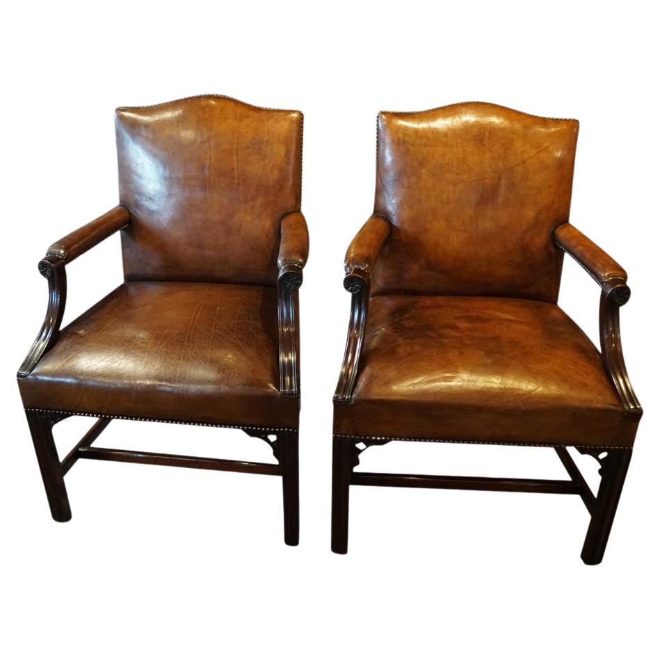 Pair of George V mahogany Gainsborough chairs 
