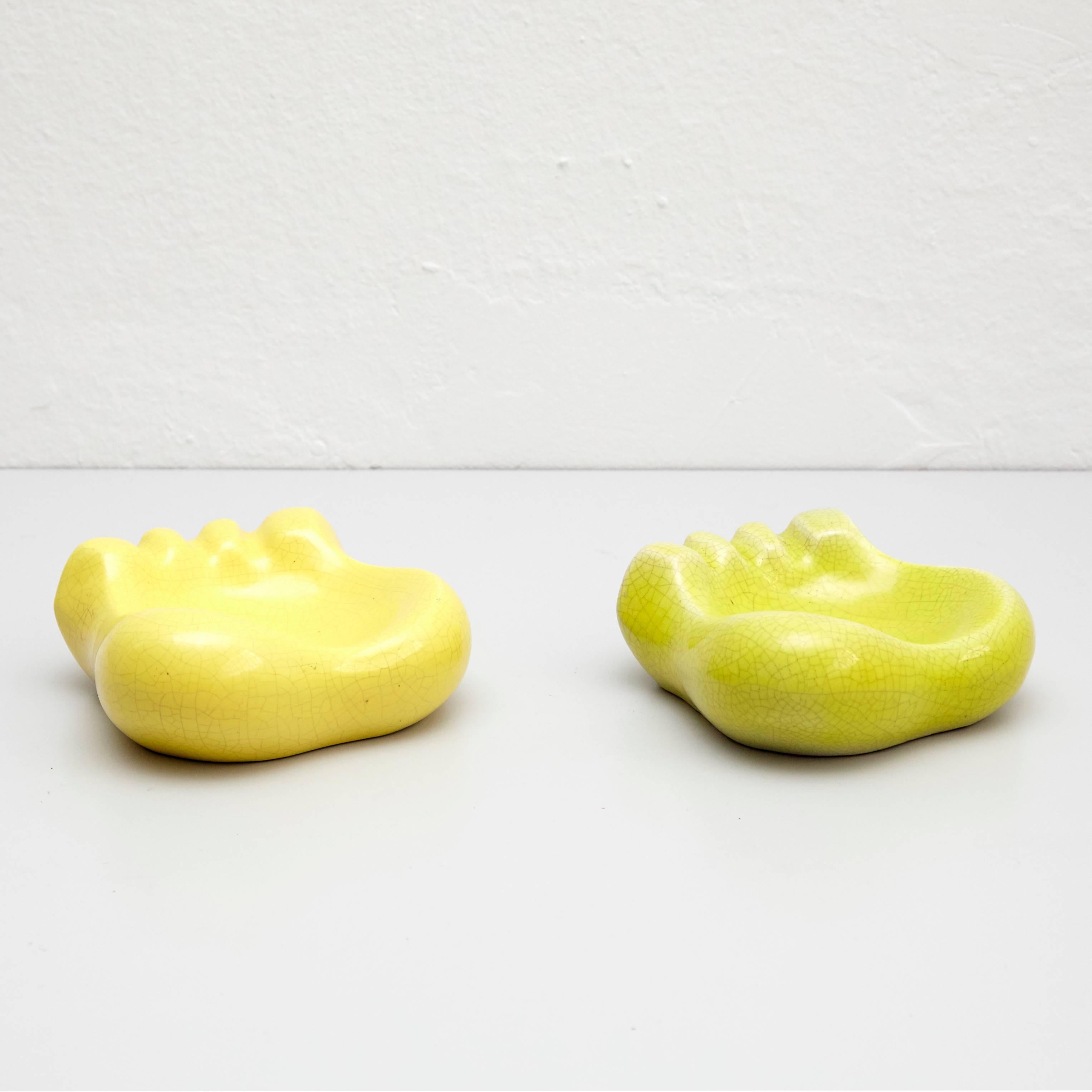 Pair of Ashtrays designed by Georges Jouve.
Manufactured in France, circa 1950.
Ceramic.

In good condition, with minor wear consistent with age and use, preserving a beautiful patina.

Georges Jouve is an important ceramist of the 20th
