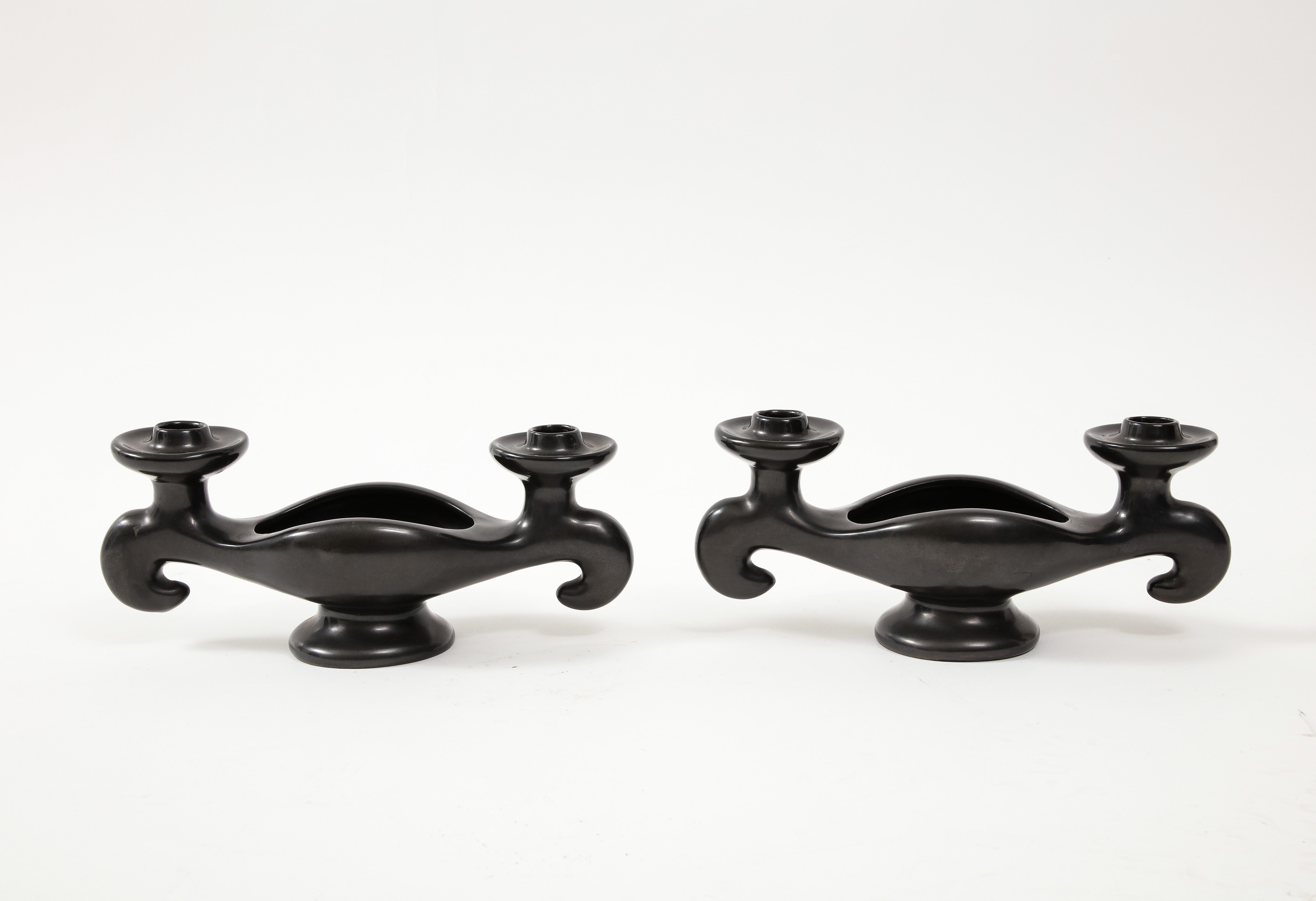 Pair of Georges Jouve Style Period candlesticks, France, c . 1950’s
Ceramic

Measures: H: 4.5 W: 11 D: 3.75 in.