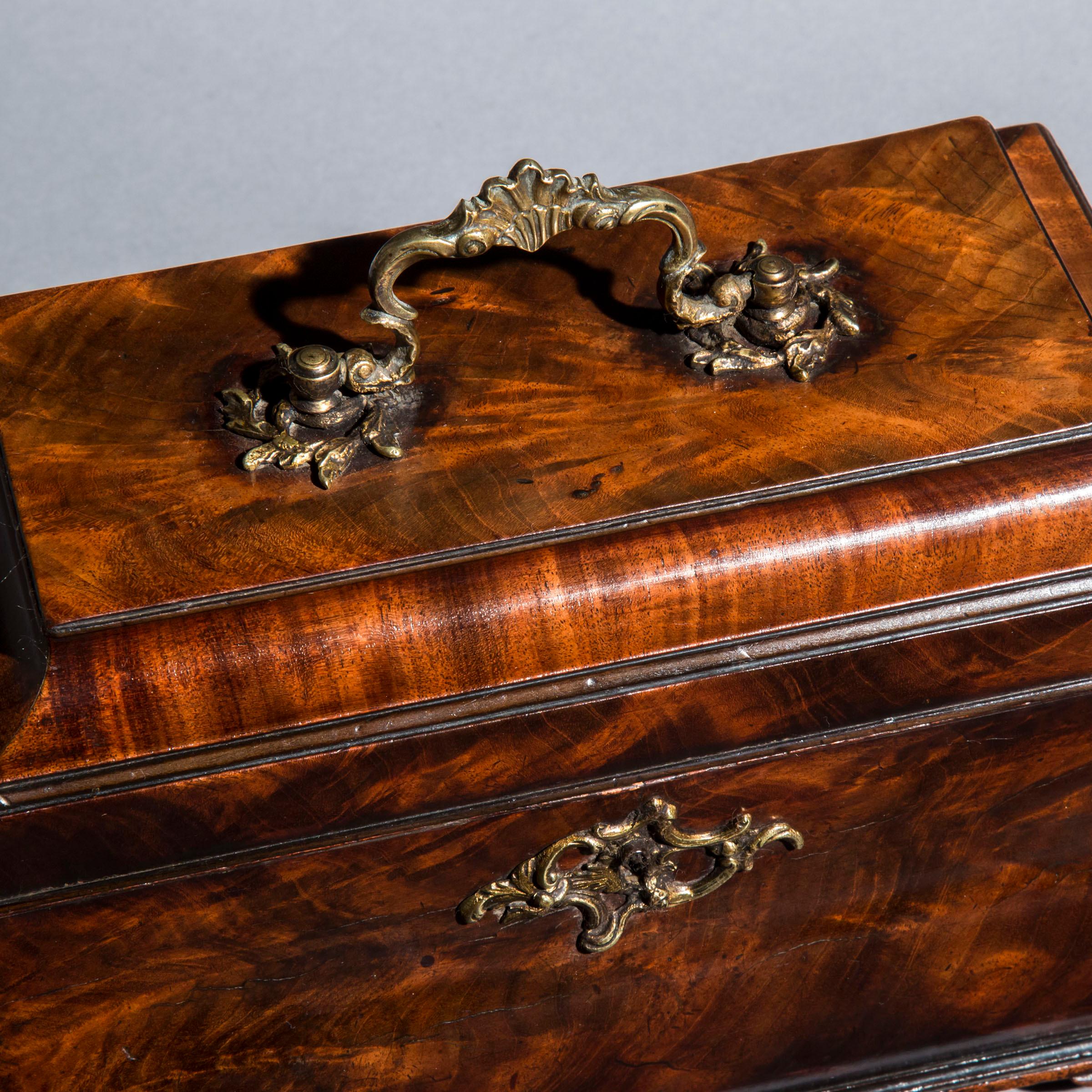 A rare matched pair of superb George III Chippendale bombé tea caddies, of splendid color and patination.
England, circa 1760.

Why we love them
Incredibly rare in this distinctive bombé form, these superb boxes display most wonderful color and
