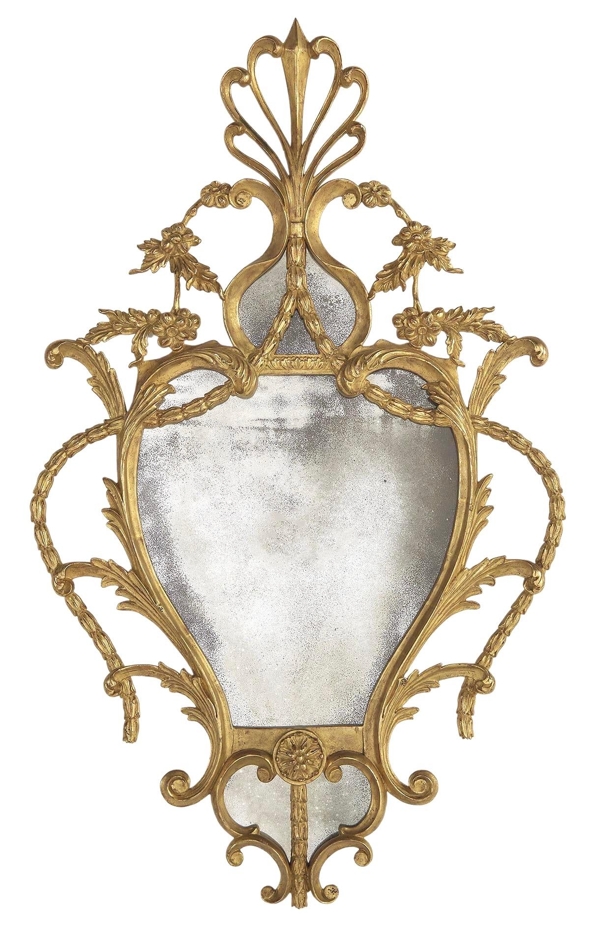 Wonderful pair of Georgian style hand carved and giltwood mirrors. Distressed mirror plate and good gilding work. Beautiful form.