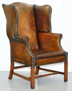 Pair of Georgian, circa 1820 Restored Hand Dyed Brown Leather Wingback Armchairs
