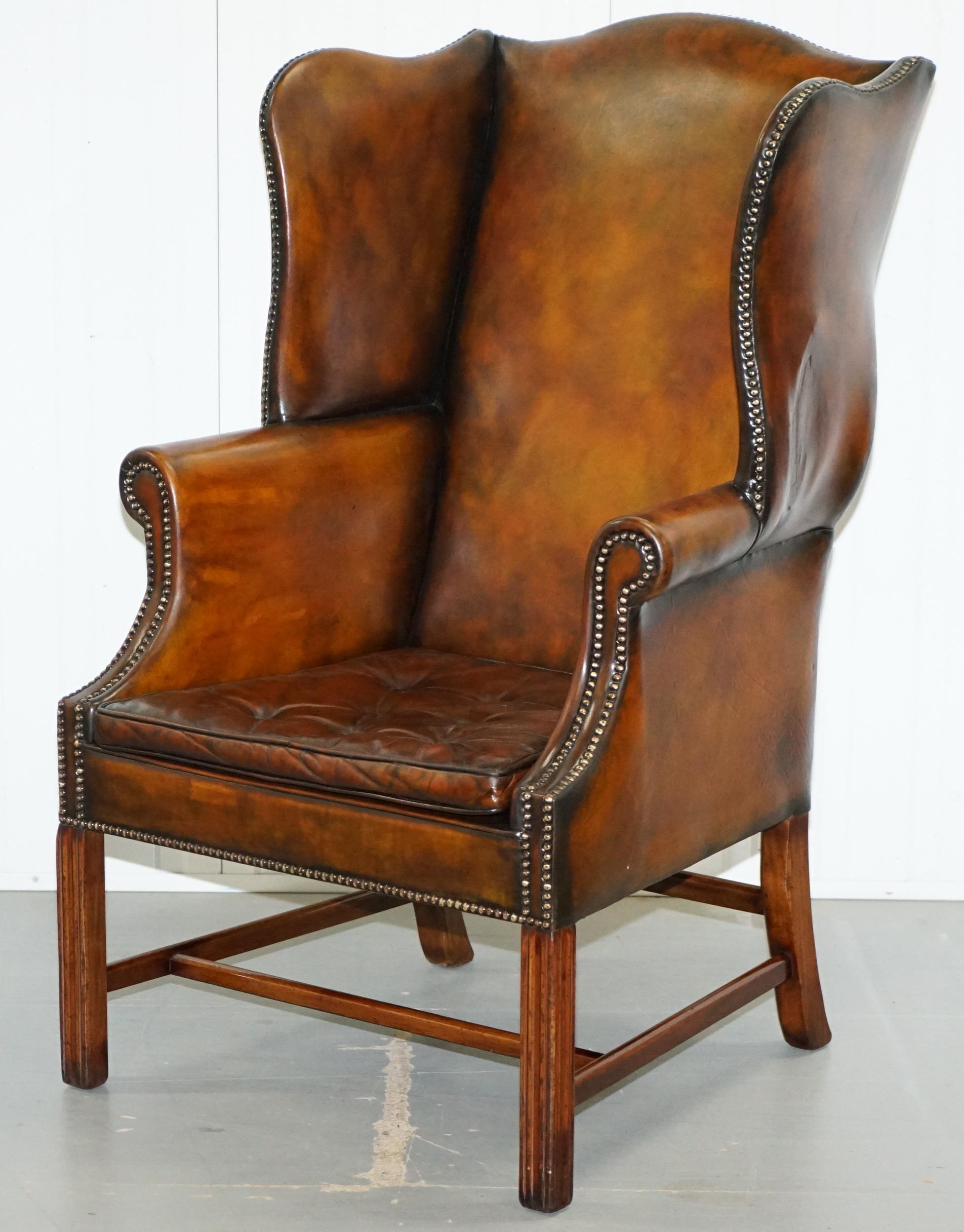 Hand-Carved Pair of Georgian, circa 1820 Restored Hand Dyed Brown Leather Wingback Armchairs