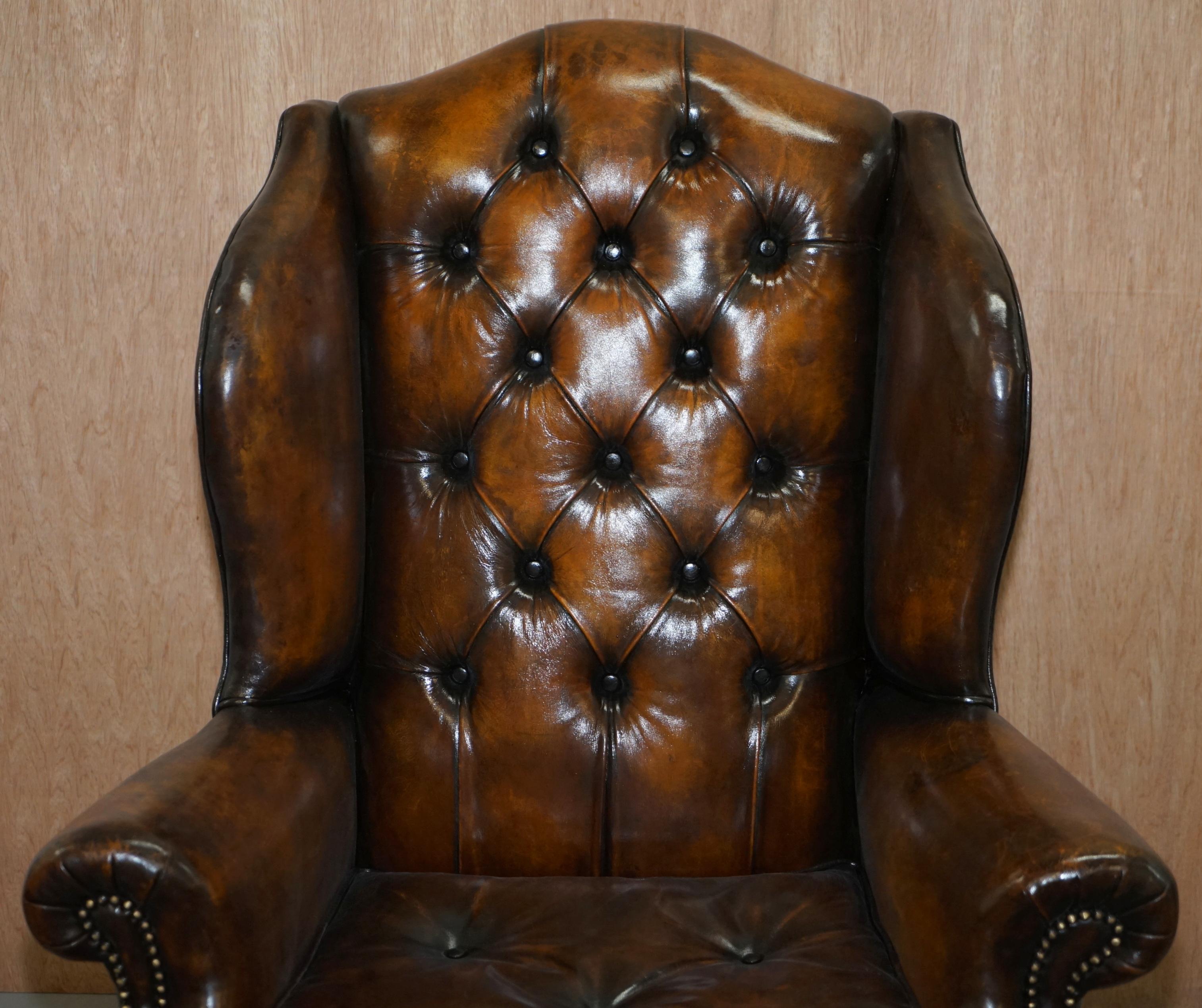 English Pair of Georgian Irish Chesterfield Brown Leather Wingback Armchairs Carved Legs