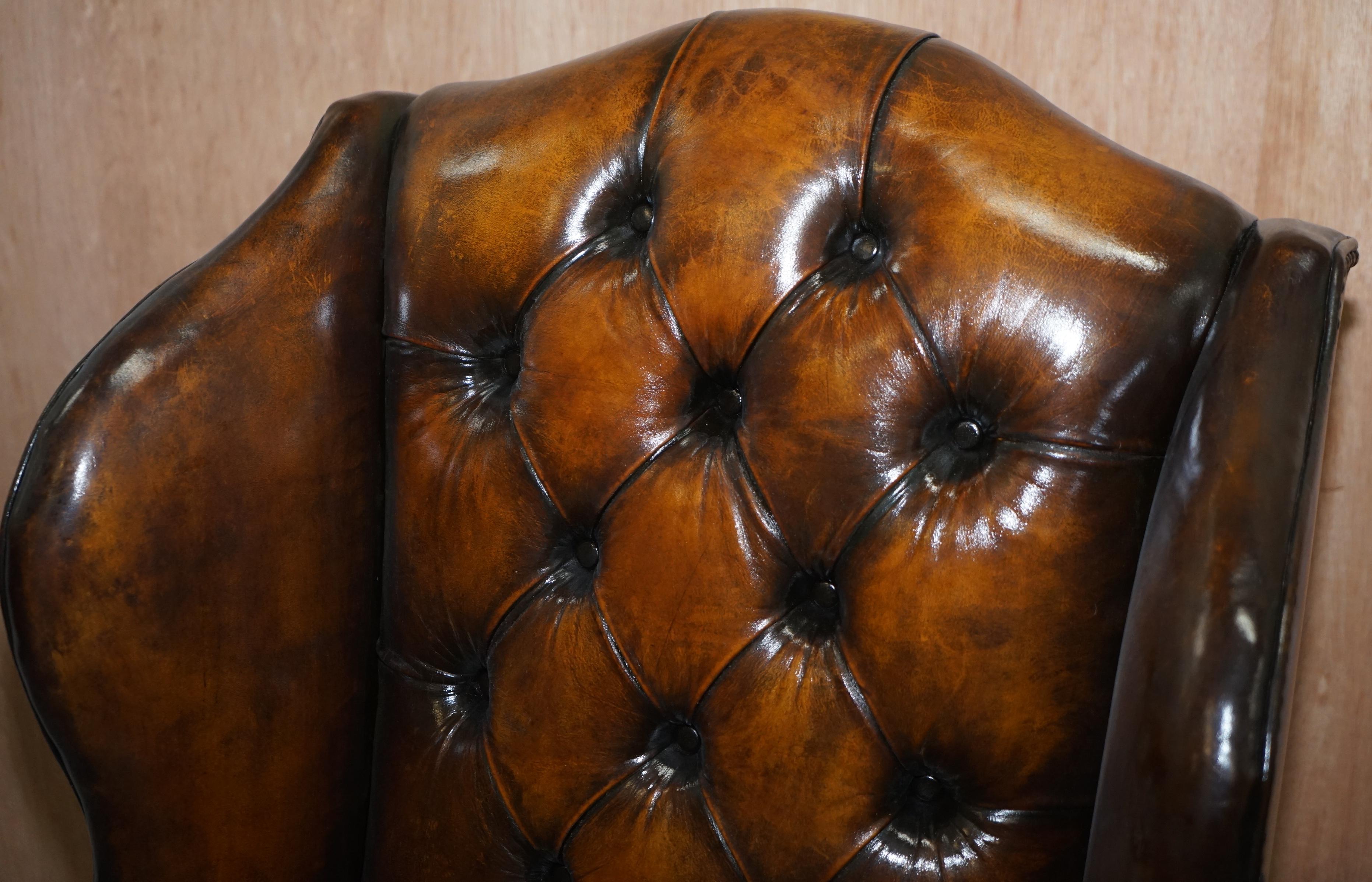 Hand-Crafted Pair of Georgian Irish Chesterfield Brown Leather Wingback Armchairs Carved Legs
